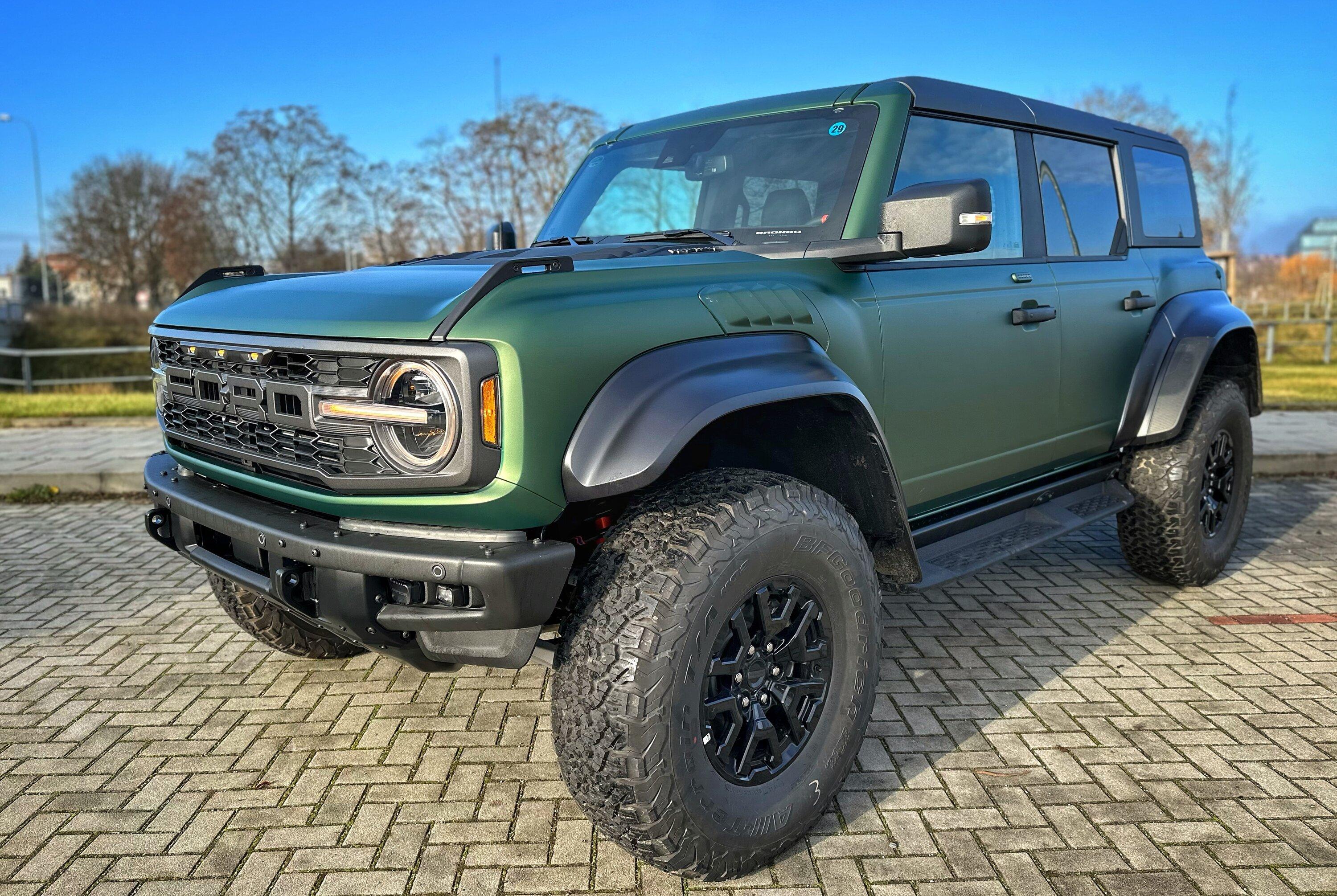 Ford Bronco Eruption Green Bronco Raptor wrapped in satin stealth PPF wrap with black bumper 67950042-C99A-4C95-9A09-7C8E58569213