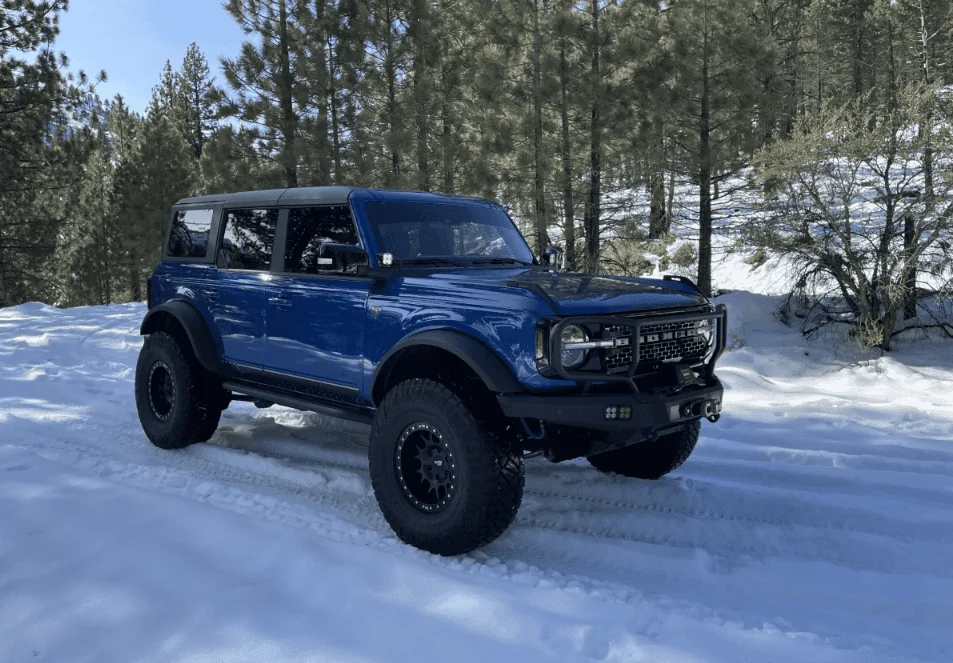 Ford Bronco Lightning Blue First Edition on 37's, 17" Dirtylife beadlocks wheels, King Shocks 1669830983167