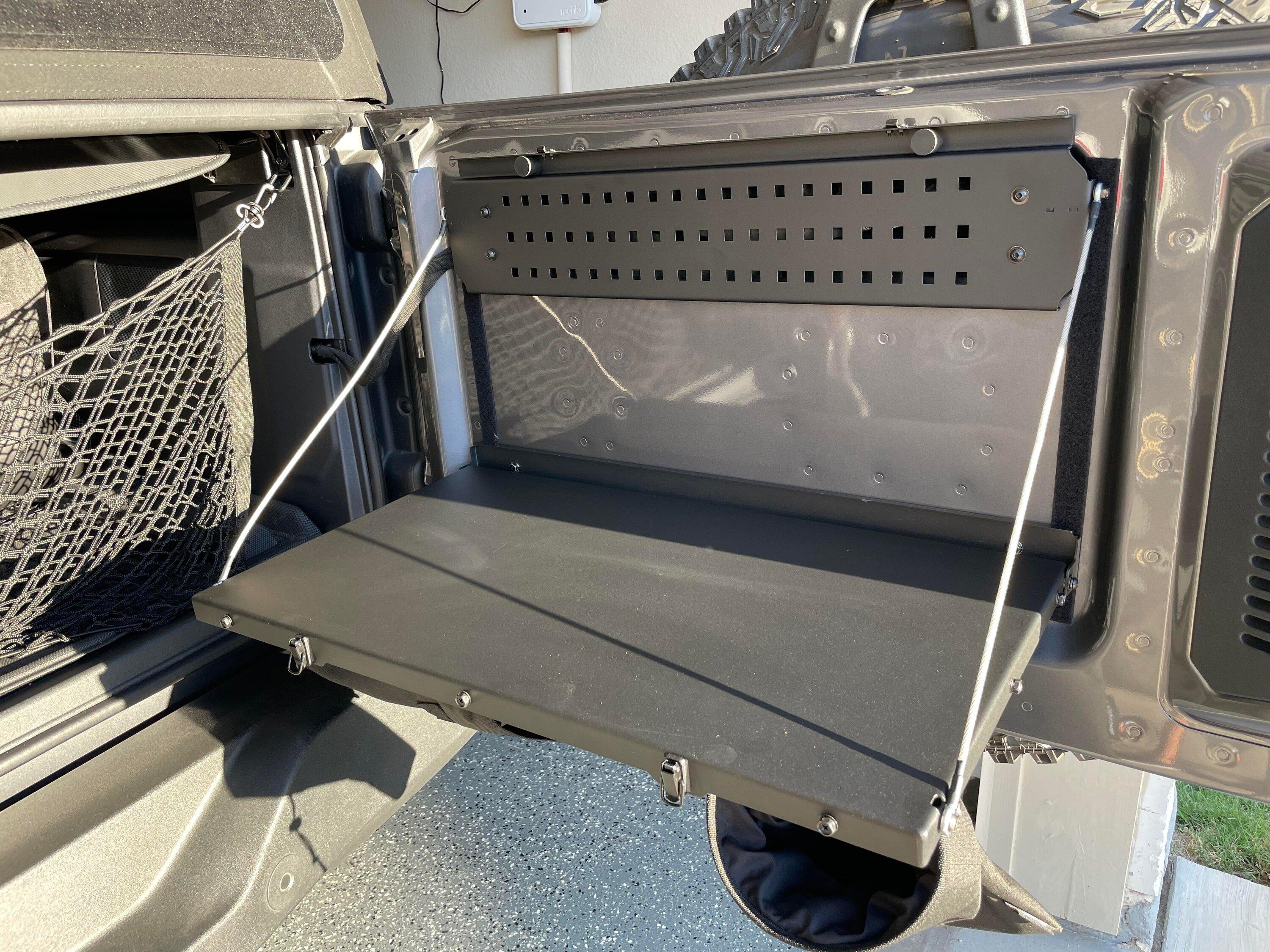 Ford Bronco Mabett Tailgate Table has rearranged its inventory! 313899133_1156340101951354_4767258844504752398_n
