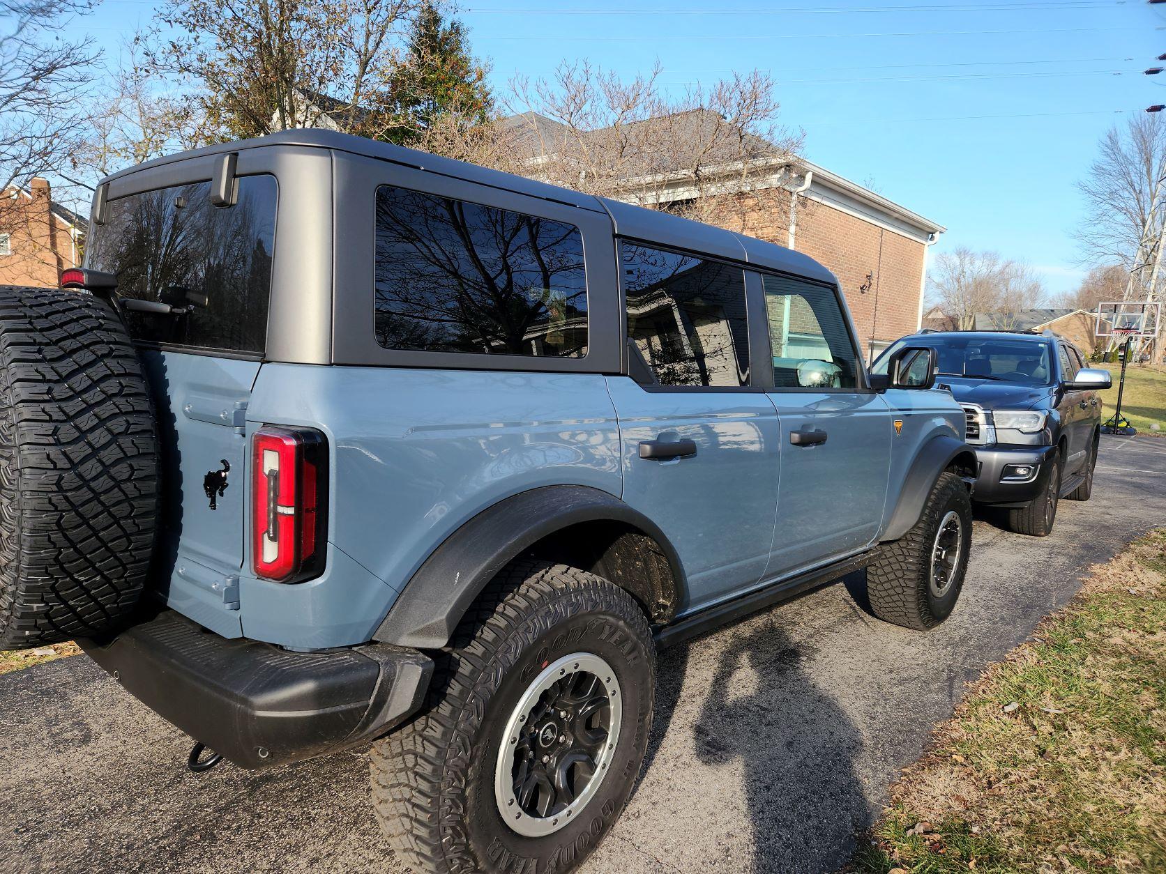 Ford Bronco Azure Gray vs Area 51 colors side-by-side comparison pics + AGM in the sun Back Passenger Sun