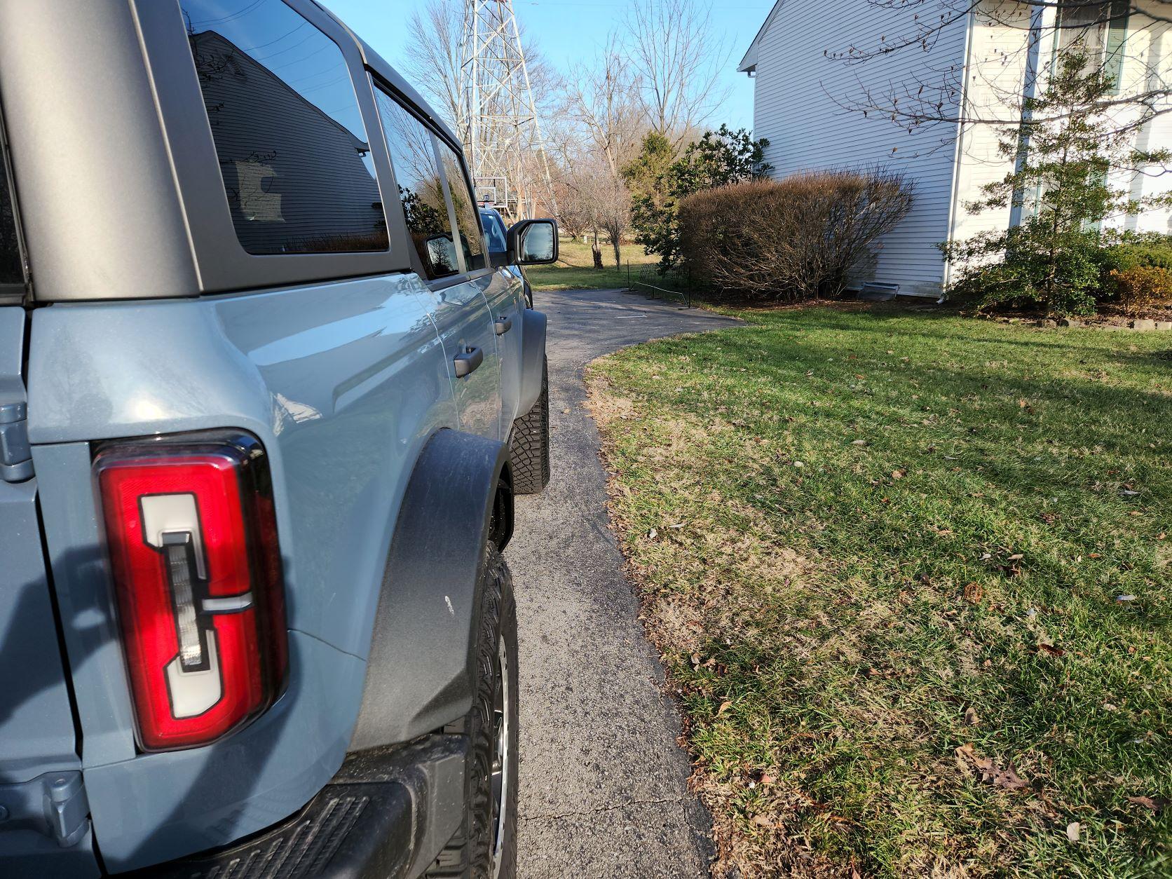 Ford Bronco Azure Gray vs Area 51 colors side-by-side comparison pics + AGM in the sun Close Up Back Passenger Sun