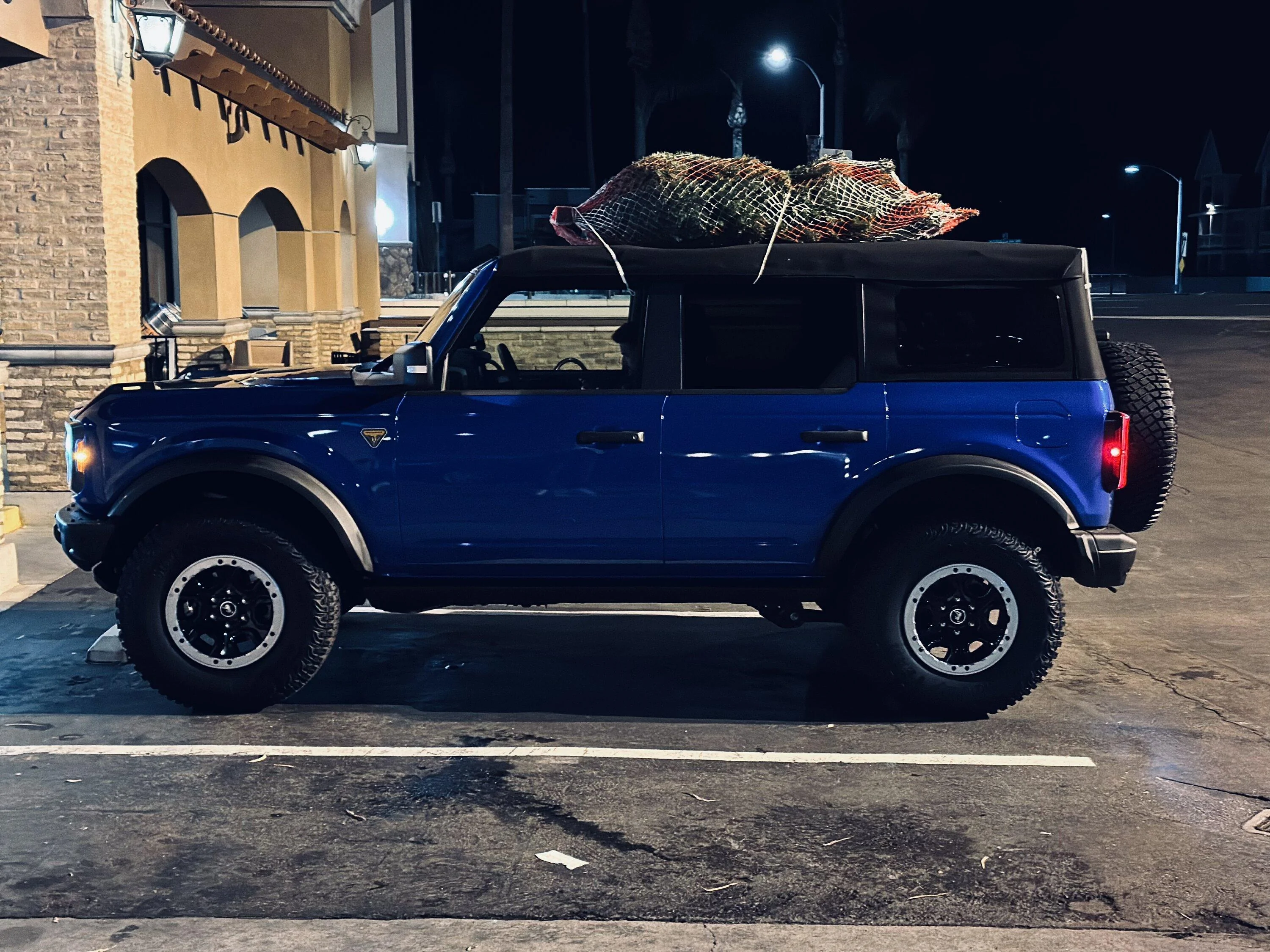 Ford Bronco Transported Christmas tree on soft top Bronco 9EB216EE-07C5-4255-BC2E-2AA4C43F1B45