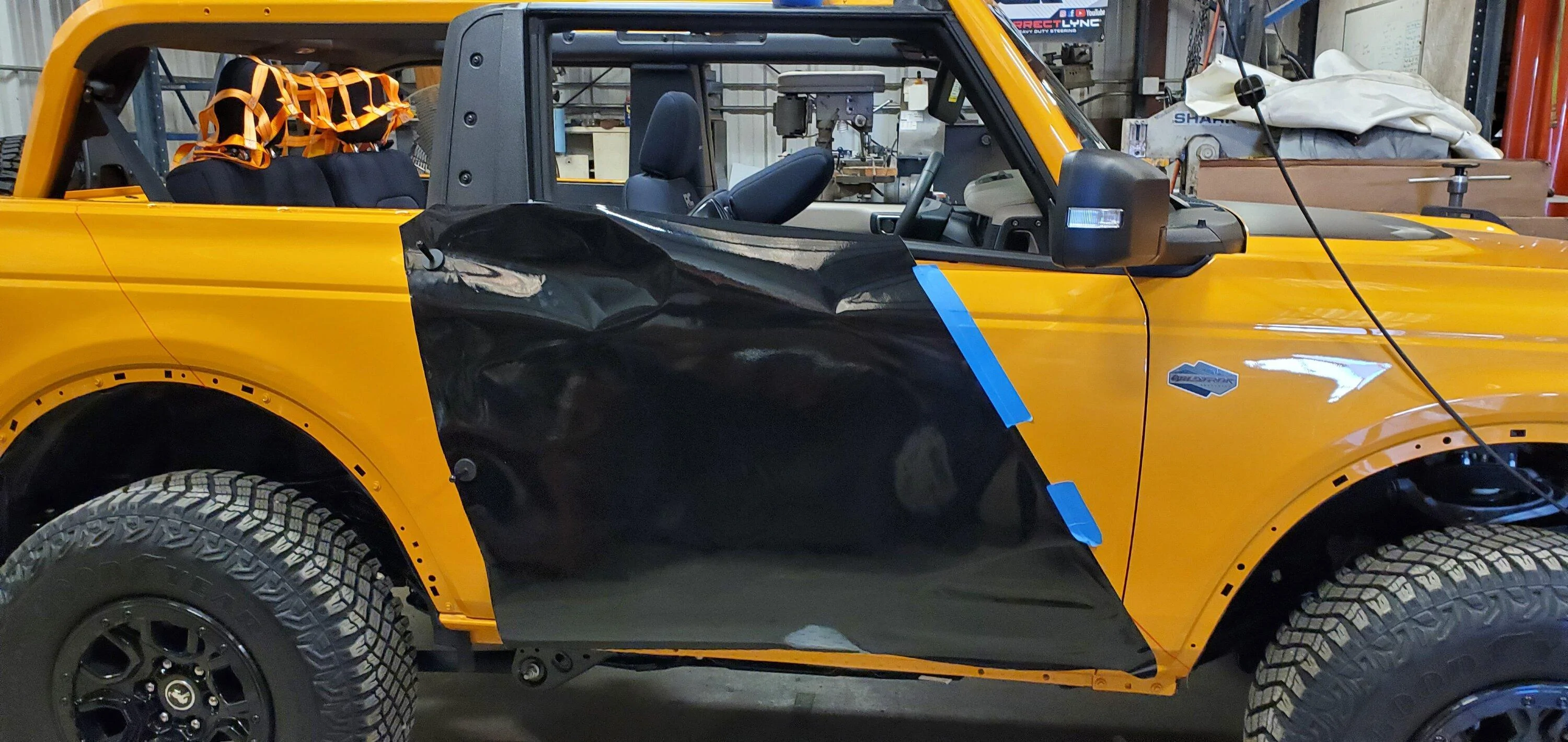 Ford Bronco Mud flaps are ugly, so I went another direction with vinyl wrap protection 20230208_151941