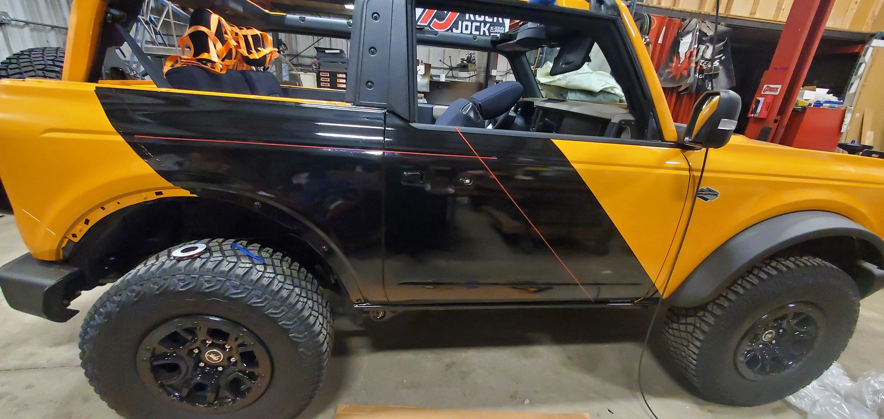 Ford Bronco Mud flaps are ugly, so I went another direction with vinyl wrap protection 20230208_210311