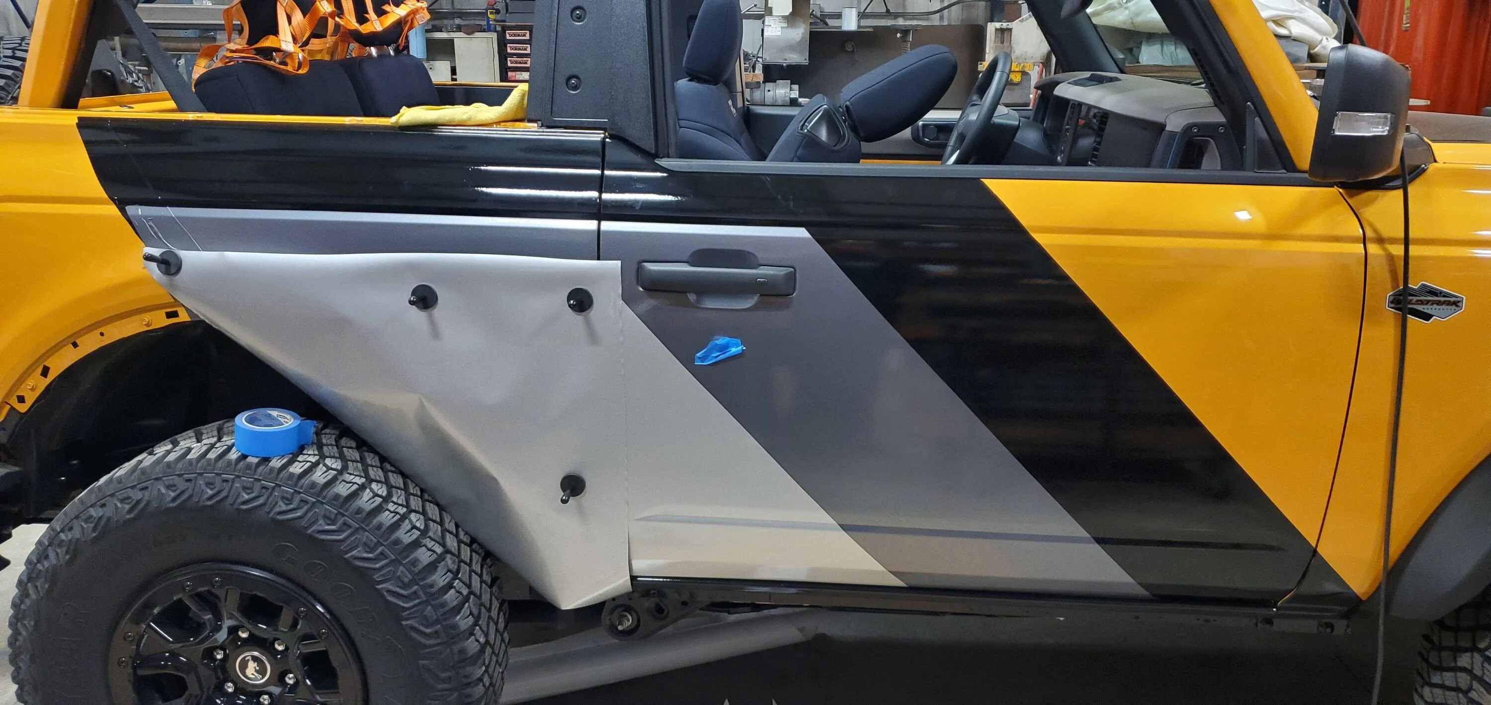 Ford Bronco Mud flaps are ugly, so I went another direction with vinyl wrap protection 20230208_230838