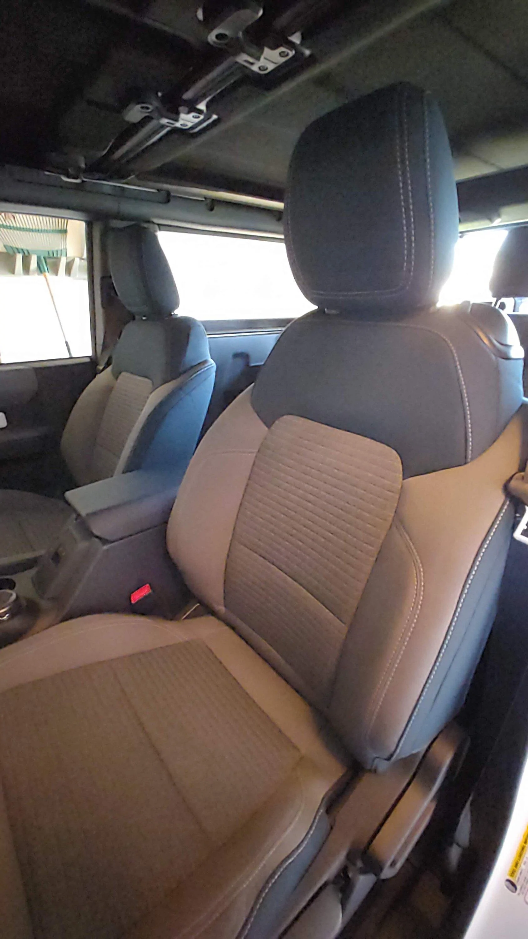 Ford Bronco Outer Base Diamond Bronco = painted steelies + custom installed Outer Banks Navy Pier cloth seat upholstery 20230211_144354