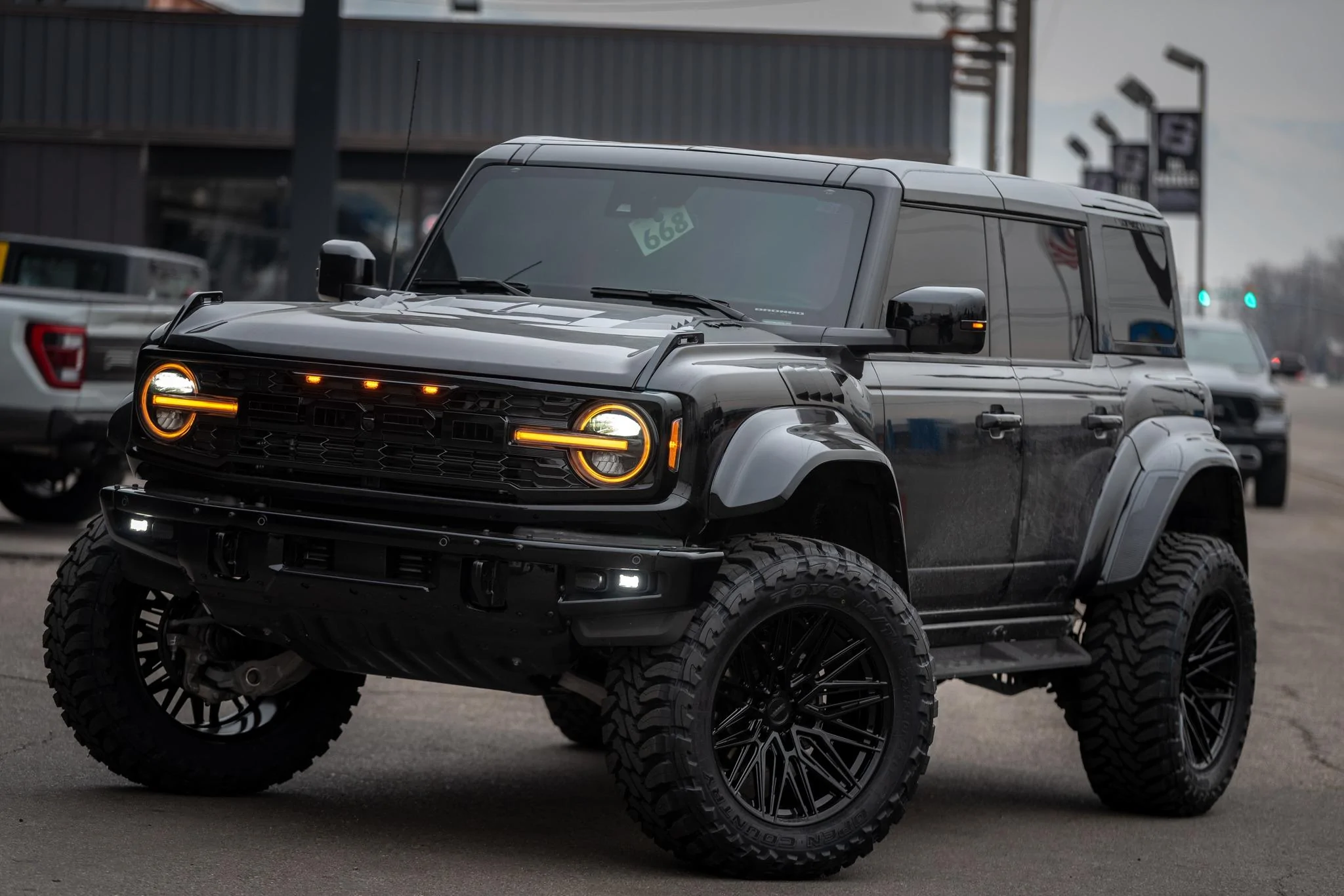 Ford Bronco Blacked-Out Bronco Raptor Street Setup Build w/ painted flares, front skid, grille, top, lights 329652526_1336264137225977_7698830836165442858_n