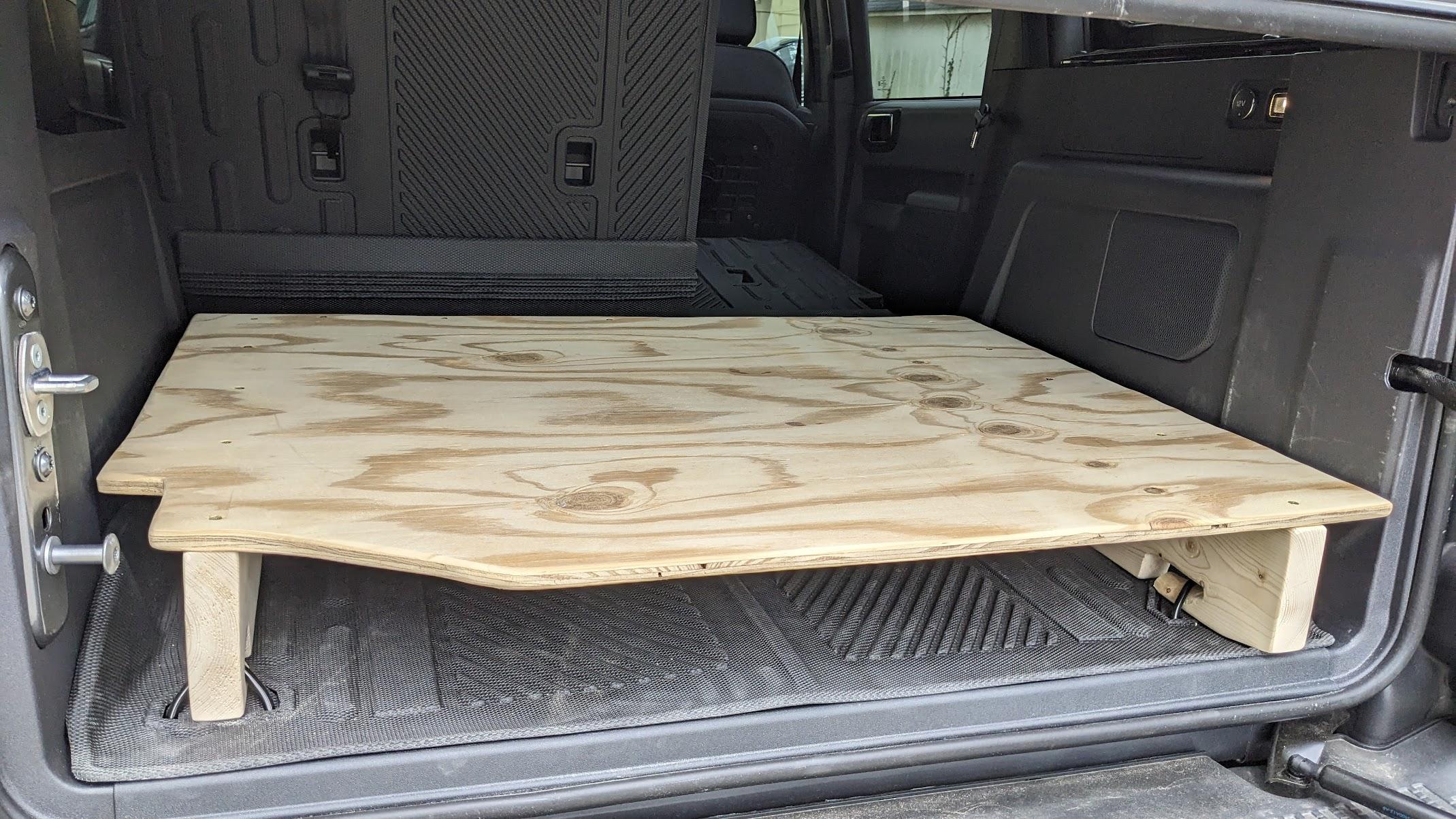 Ford Bronco My custom Raised Trunk Cargo Platform that locks into floor D rings for security glued and screwed