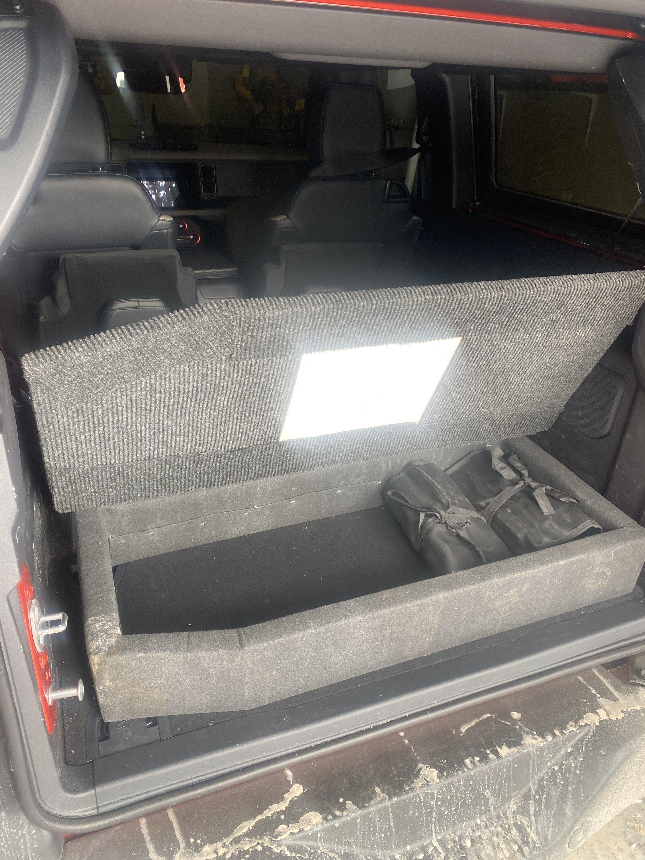 Ford Bronco My custom Raised Trunk Cargo Platform that locks into floor D rings for security 9539CFBF-C3CC-446D-9795-8A0E5D563DB3