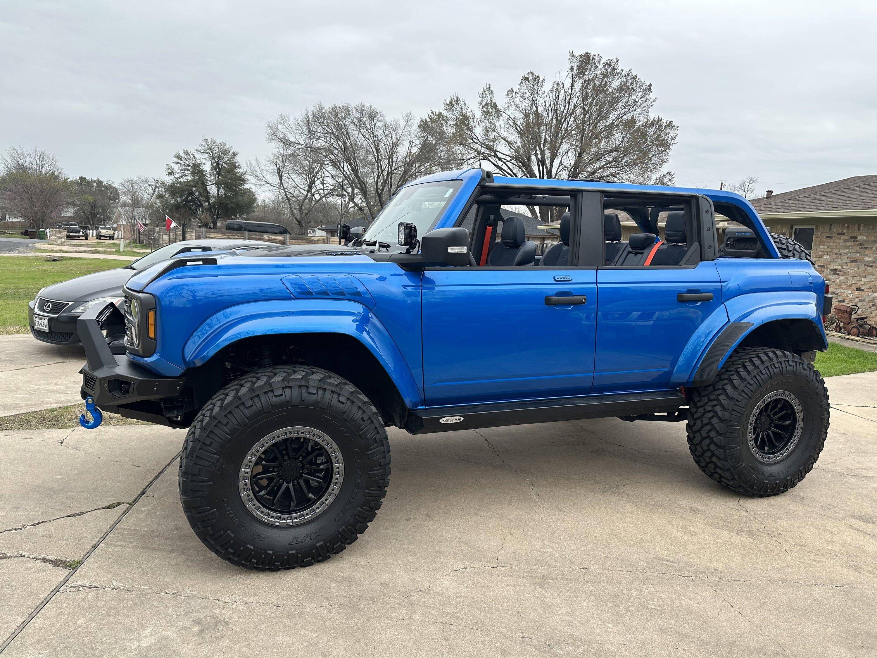 Ford Bronco Velocity Blue Bronco Raptor on RPG perch collar lift, 38's and painted flares img-4603-