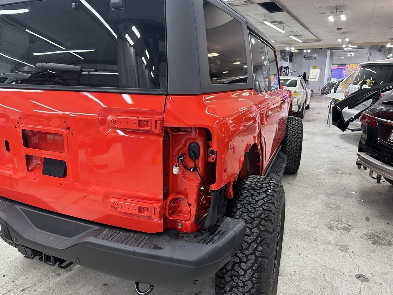 Ford Bronco Code Orange Bronco Raptor with XPEL PPF and XPEL Stealth on the Flares IMG_1347
