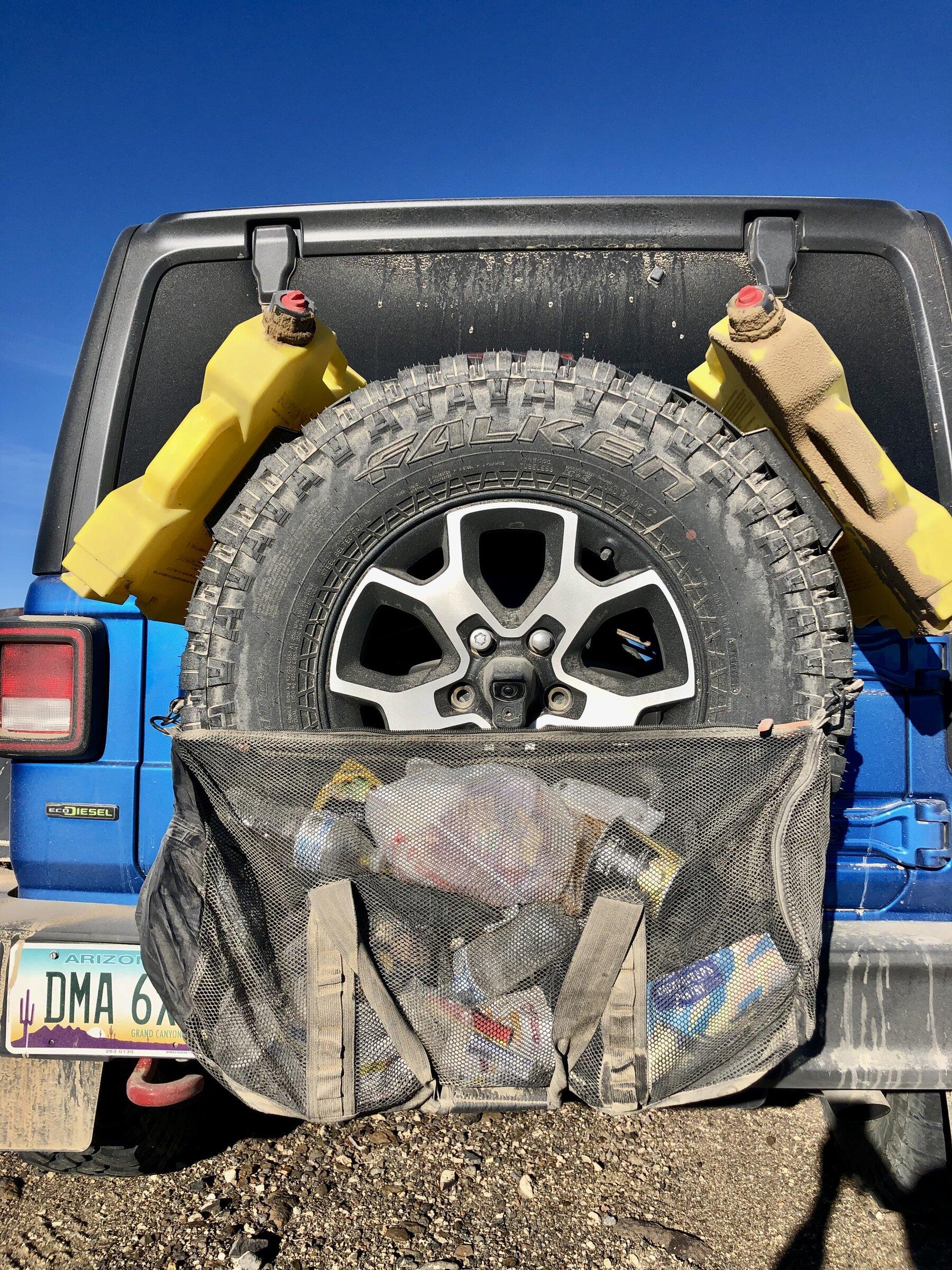 Ford Bronco Trash bag off spare (that doesn't block rear camera)? LgwTT0G