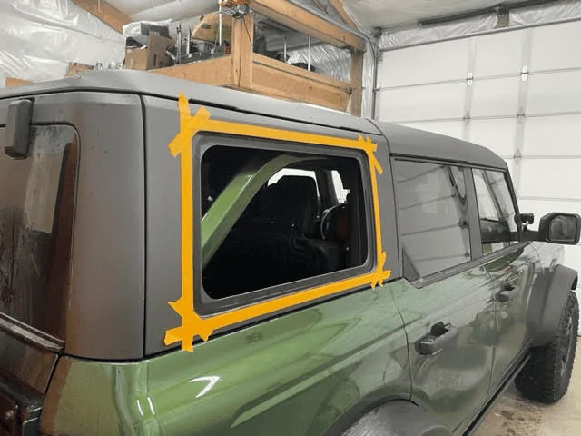 Ford Bronco Velox Gull Wing doors installed in MIC hard top 1680541549434