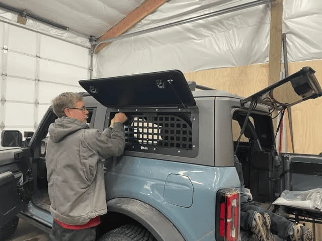 Ford Bronco Velox Gull Wing doors installed in MIC hard top 1680541595546
