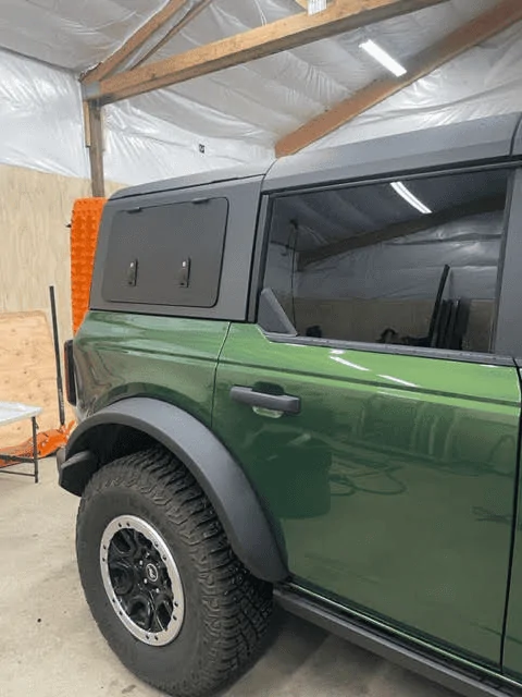 Ford Bronco Velox Gull Wing doors installed in MIC hard top 1680541858533
