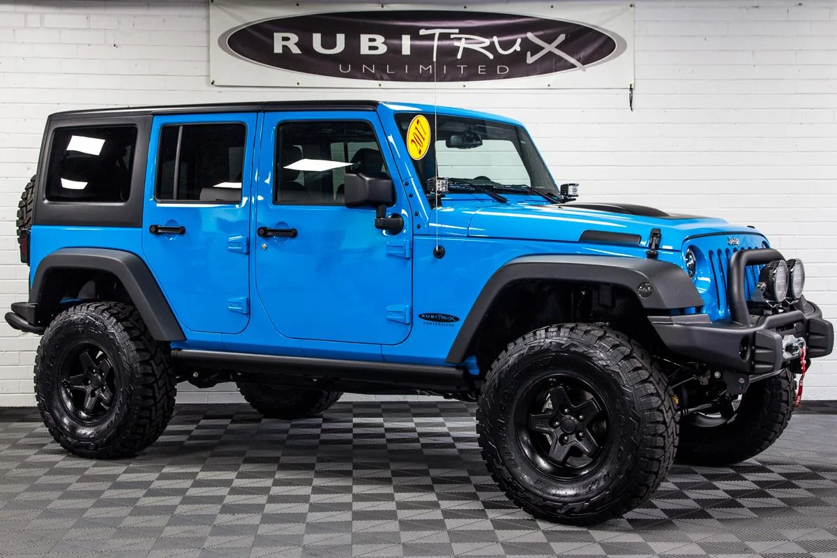 Ford Bronco APPLES (BRONCO) VS ORANGES (WRANGLER) wrangler-rubicon-jk-jku-chief-blue-passenger-front