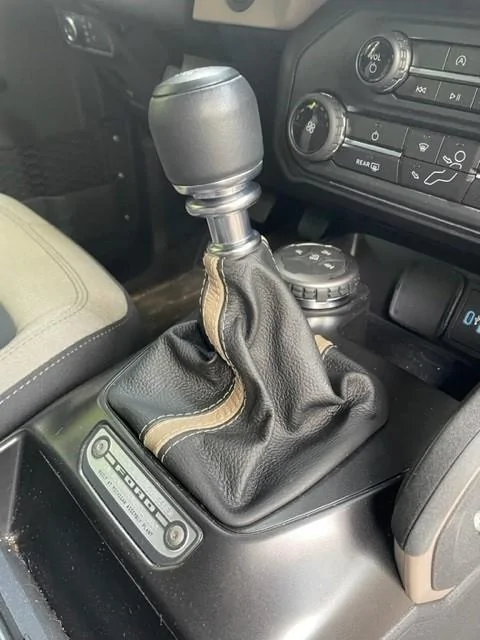 Ford Bronco Got Redline custom leather console and shift boot installed. 21