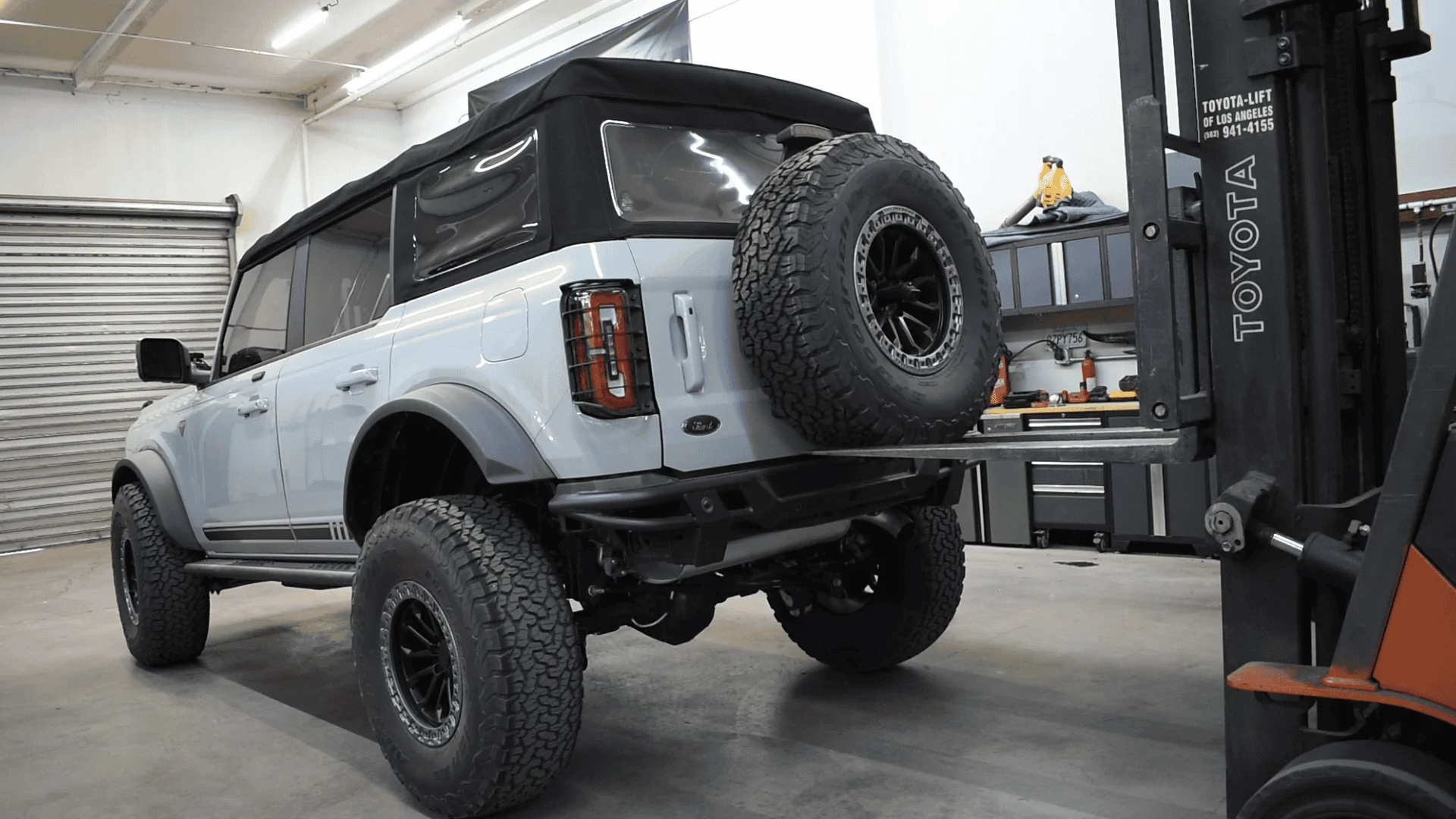 Ford Bronco Lifting our Bronco by the Tire Carrier (by Turn Offroad) with a Forklift ST1-M4 Videos-00;06;07;23