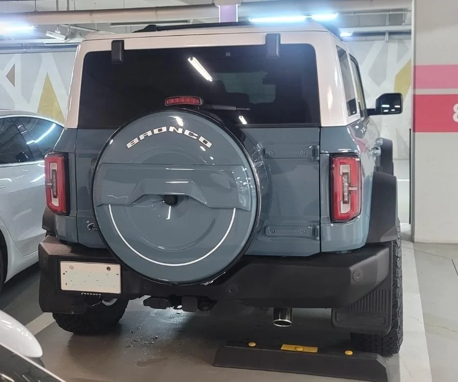 Ford Bronco Spare tire cover made from tire cover, paint and stainless rims Screenshot_20230714_225406_Gallery