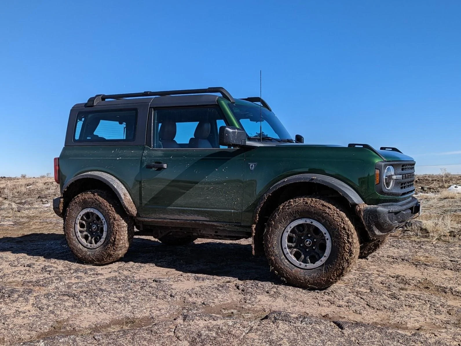 Ford Bronco Eruption green with the matte white side stripe PXL_20230225_210129588