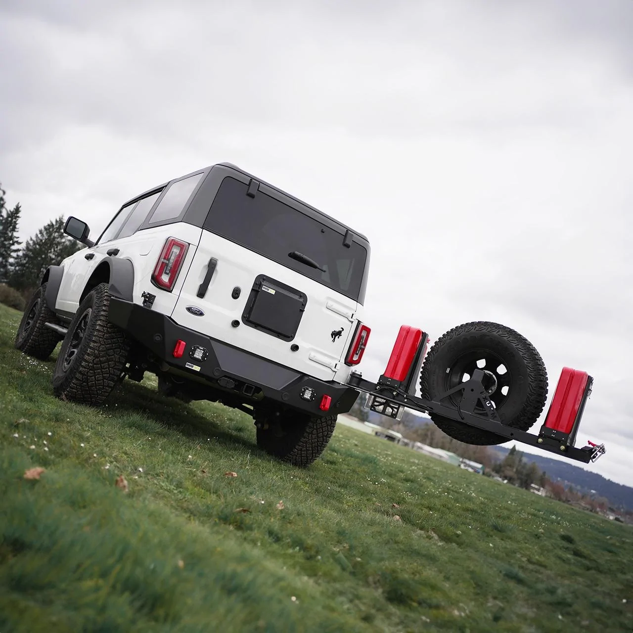 Ford Bronco Rear swing-out bumpers are now taking orders!  $500 off promo.   Get that tire off your back door and carry 11gal more fuel! Bronco_rear_open
