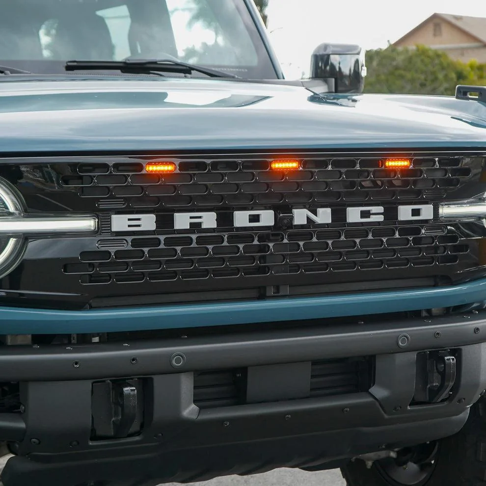 Ford Bronco Bronco LED Shop - Plug & Play LED Grille Lights -EvergladesLED-Raptor-GrilleLights3AmberBulbs_990x