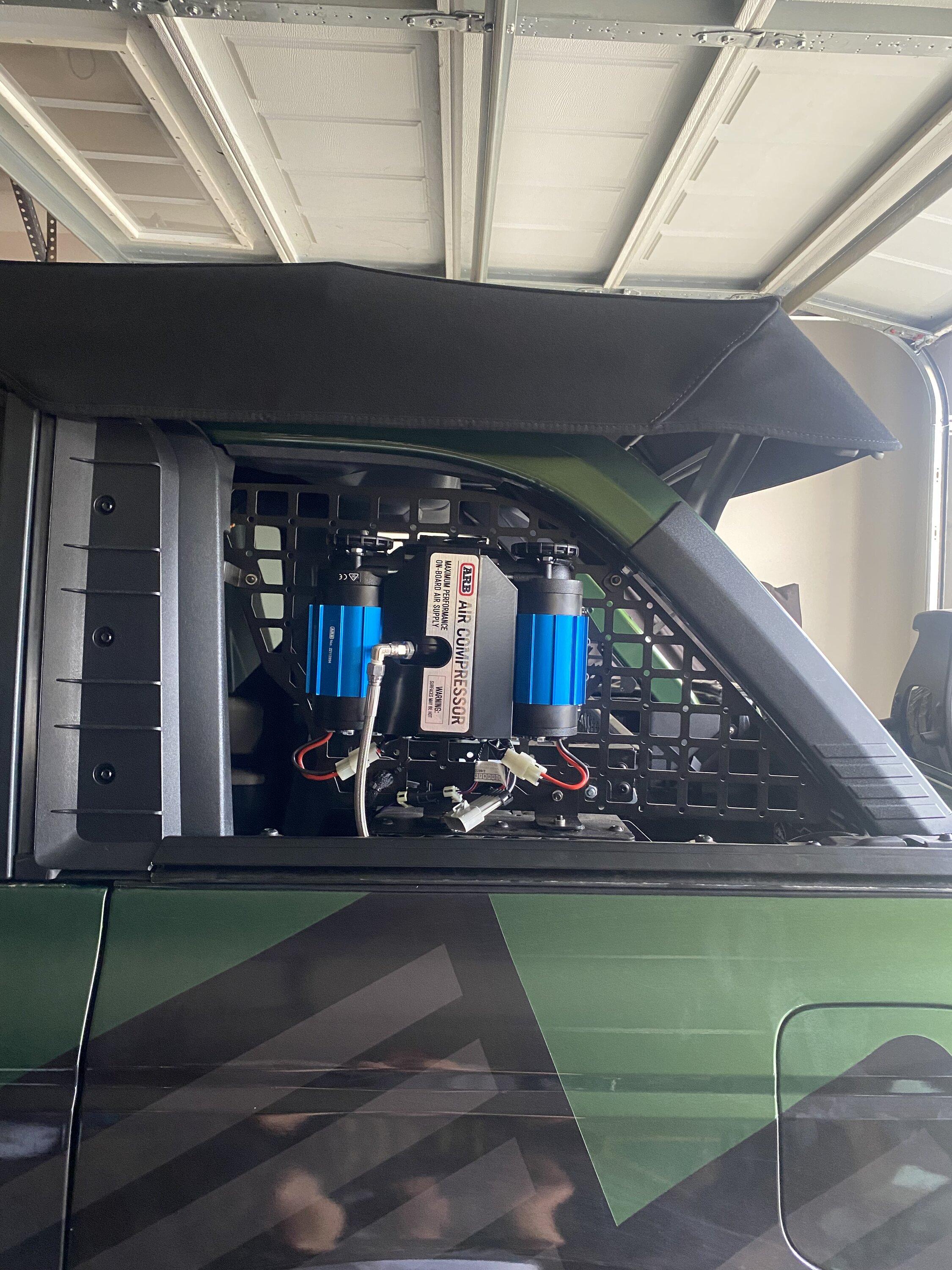 Ford Bronco Alternative ARB twin compressor mounting location:  upper roll bar molle panel IMG_3904