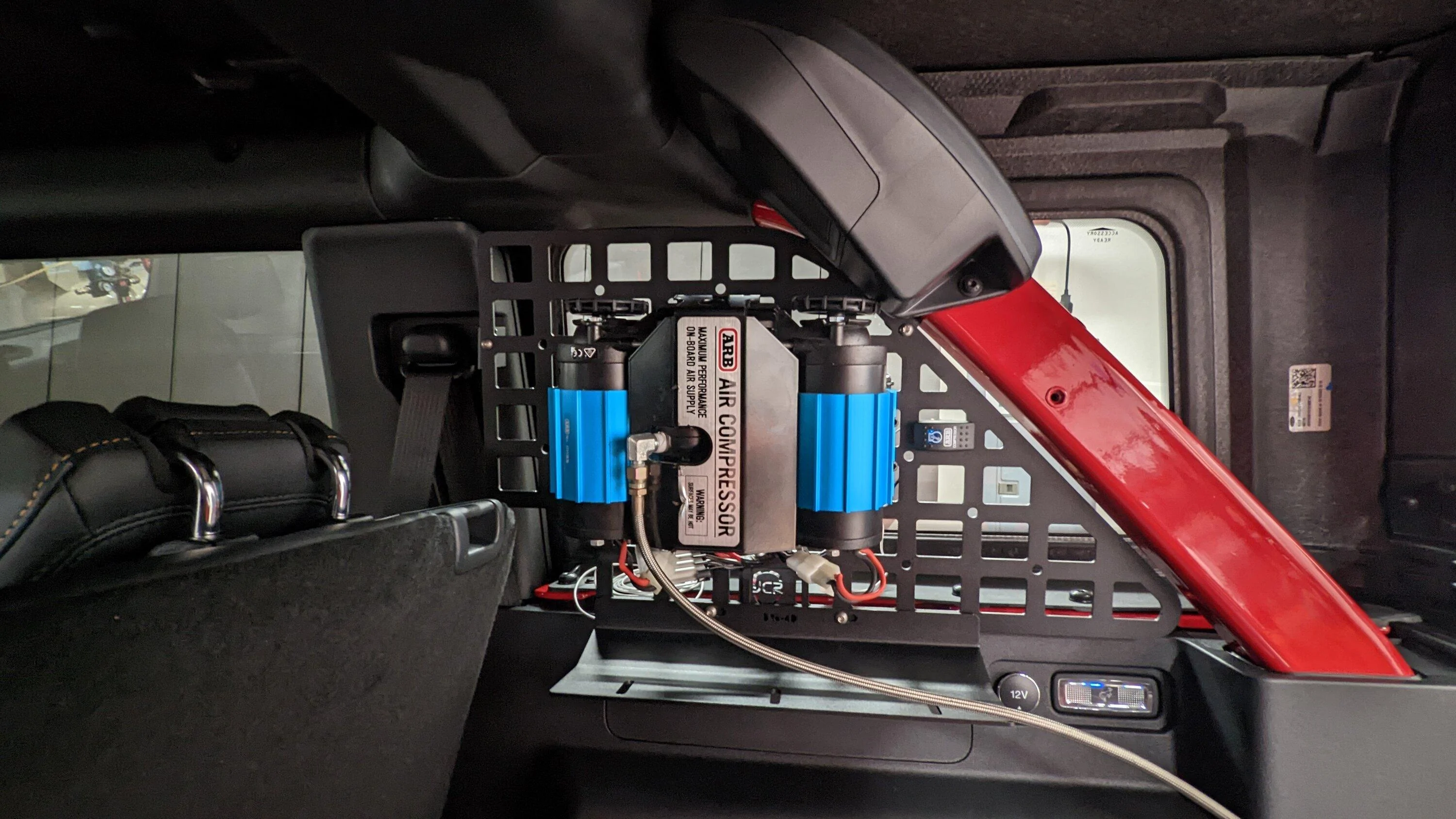 Ford Bronco Alternative ARB twin compressor mounting location:  upper roll bar molle panel PXL_20221130_235356671