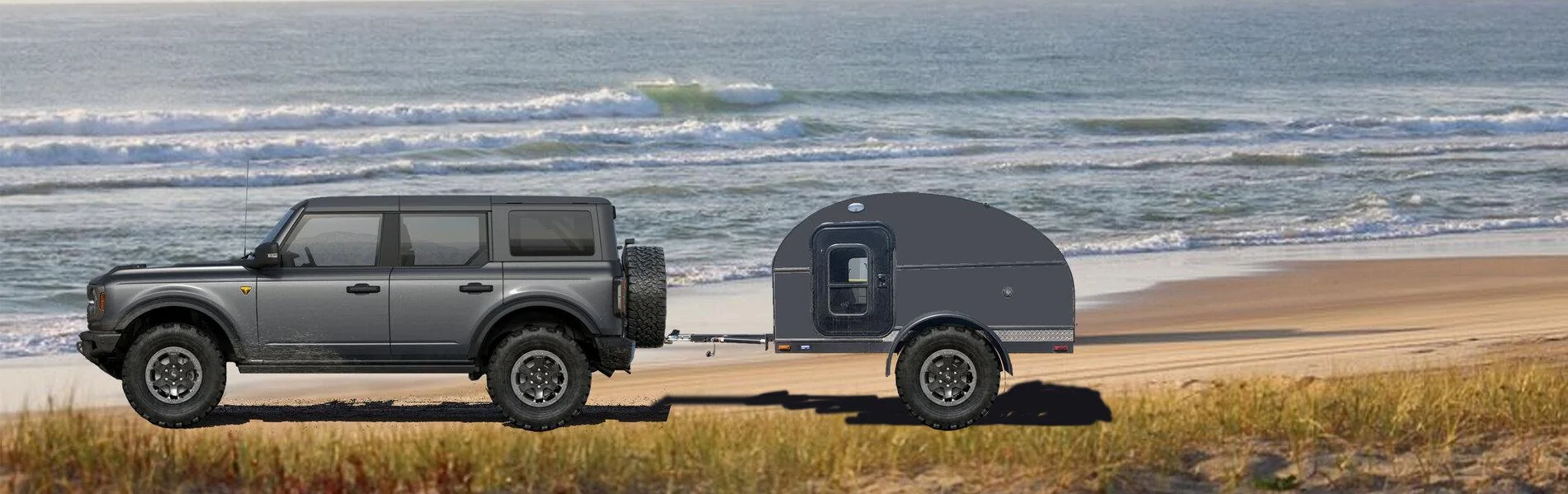 Ford Bronco Badlands vs Wildtrak Bronco & Trailer side view - Badlands - Carbonized Grey
