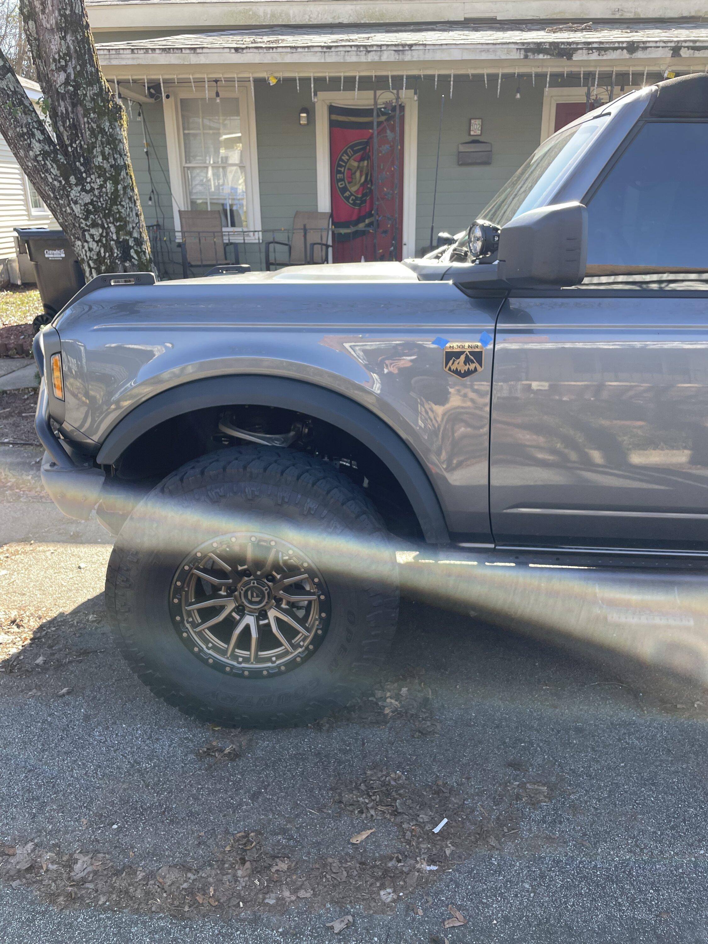 Ford Bronco Anyone find some Bronze Script Badges that match bronze Fuel Wheels? IMG_3785