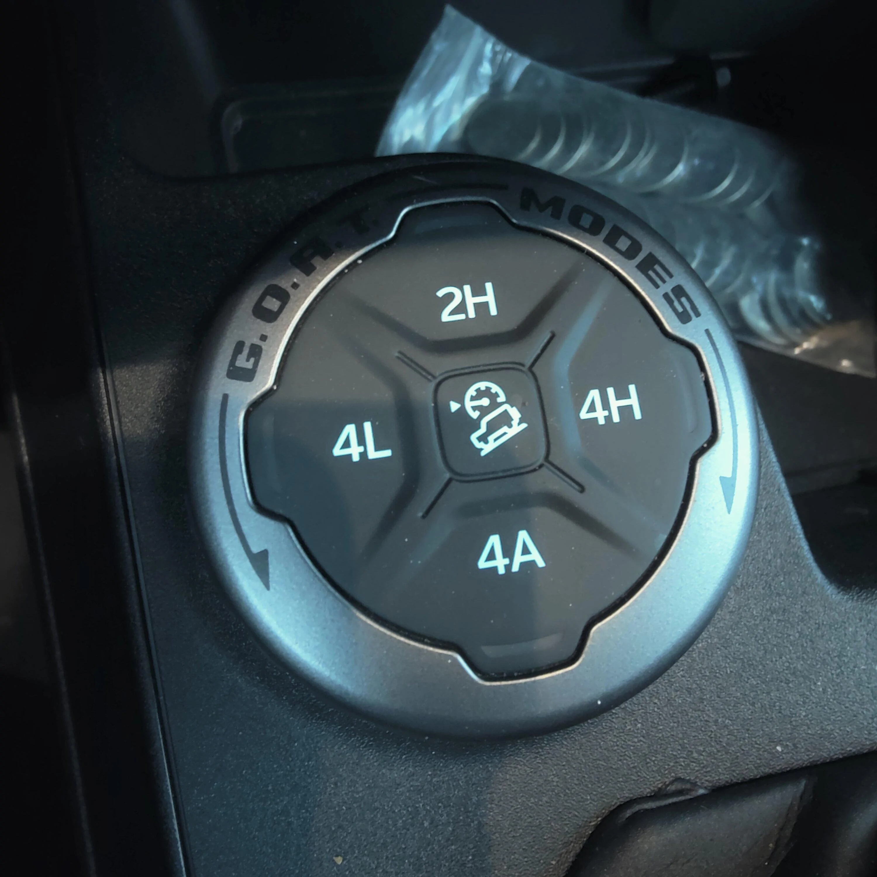 Ford Bronco What is the difference between the center button on goat mode dial? IMG20231214161148