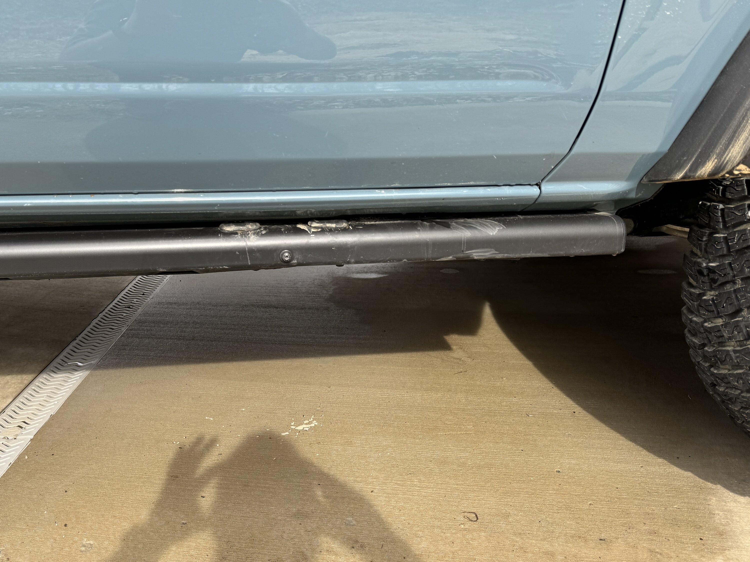 Ford Bronco Factory rock rails with removable step bent IMG_6210.JPG
