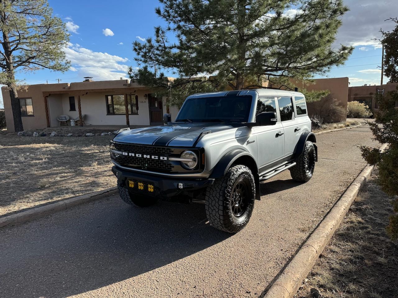 Ford Bronco Tejona the Wildtrak Iconic silver Bronco with Method 703 matte black wheels