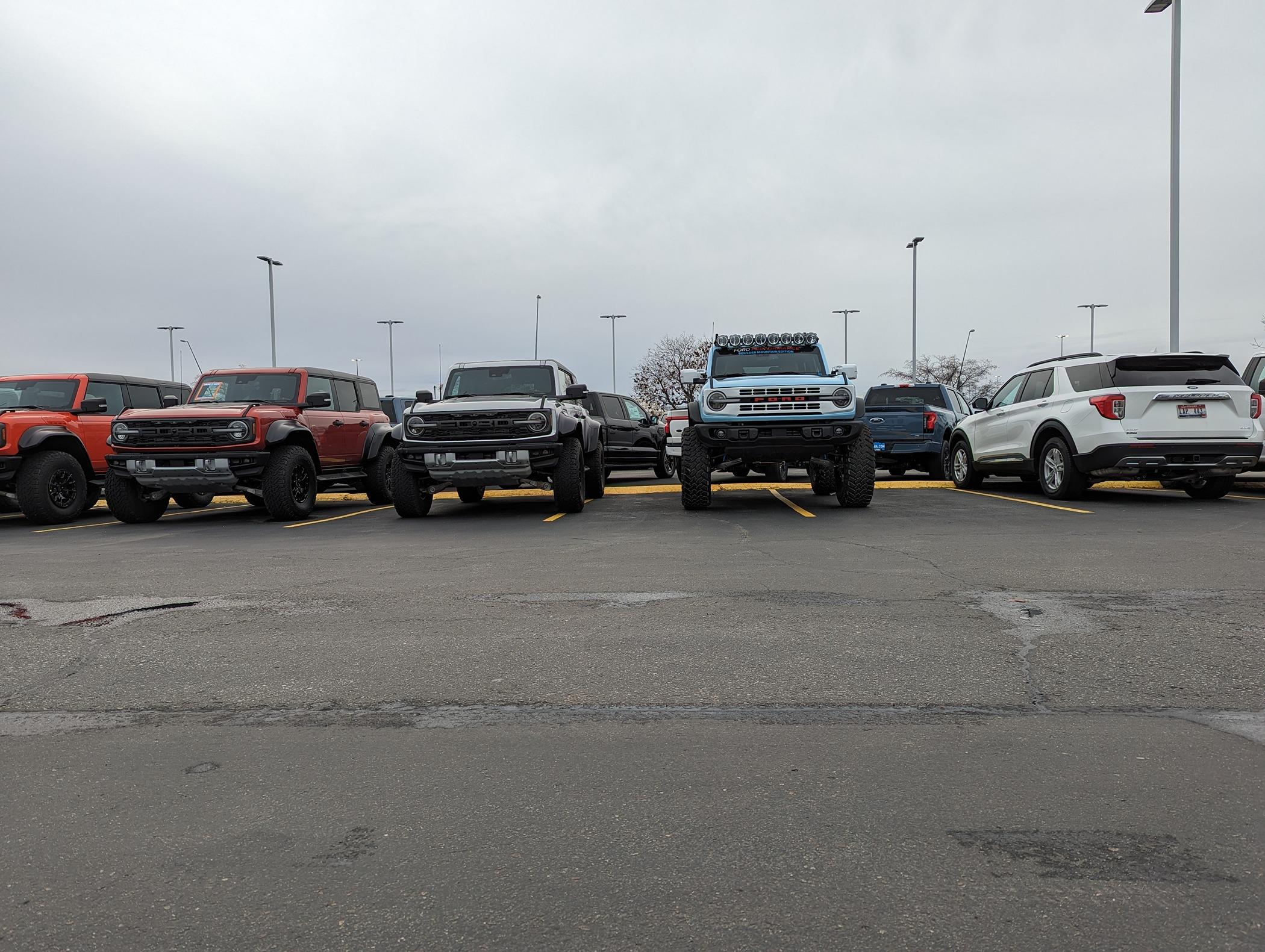 Ford Bronco HERITAGE EDITION Bronco Club next to a raptor