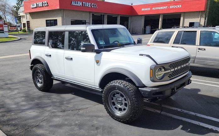 Ford Bronco New Falken AT4W 35/11.5 17 tires Passenger quarter front BFG KO2 285 - 75 - 17 with Method 705's