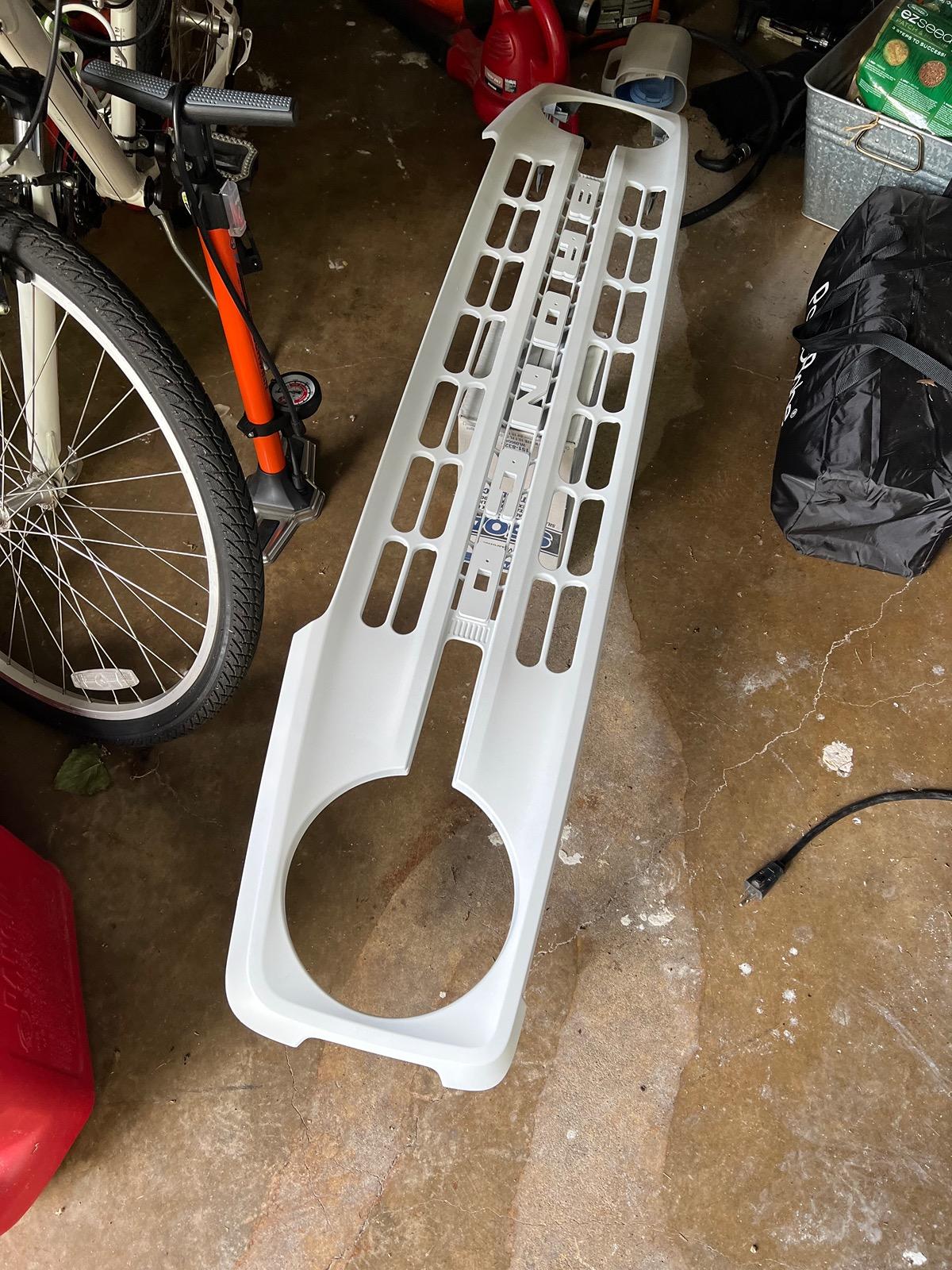 Ford Bronco Heritage style grill with two cans of Rustoleum spray paint IMG_2684