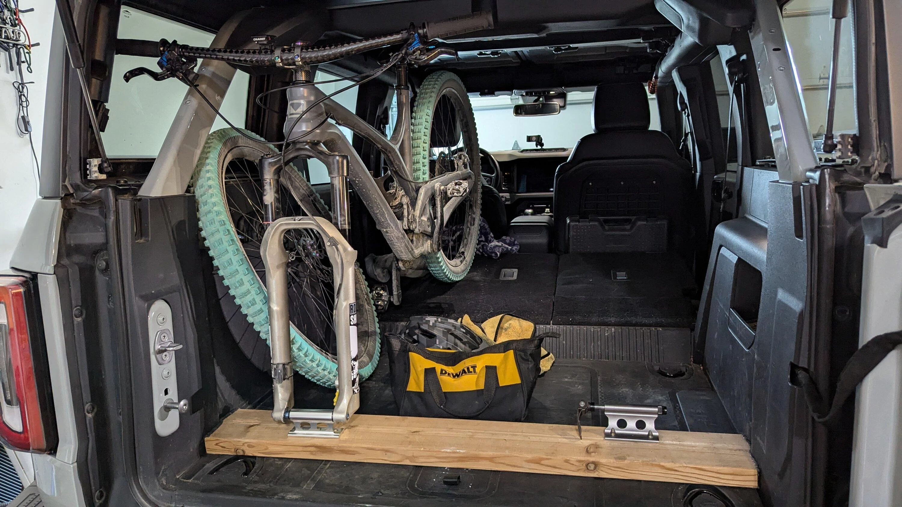 Ford Bronco Got Bikes? Cheap, safe bike storage! DIY fork holder rack using a 2x6 1000003379