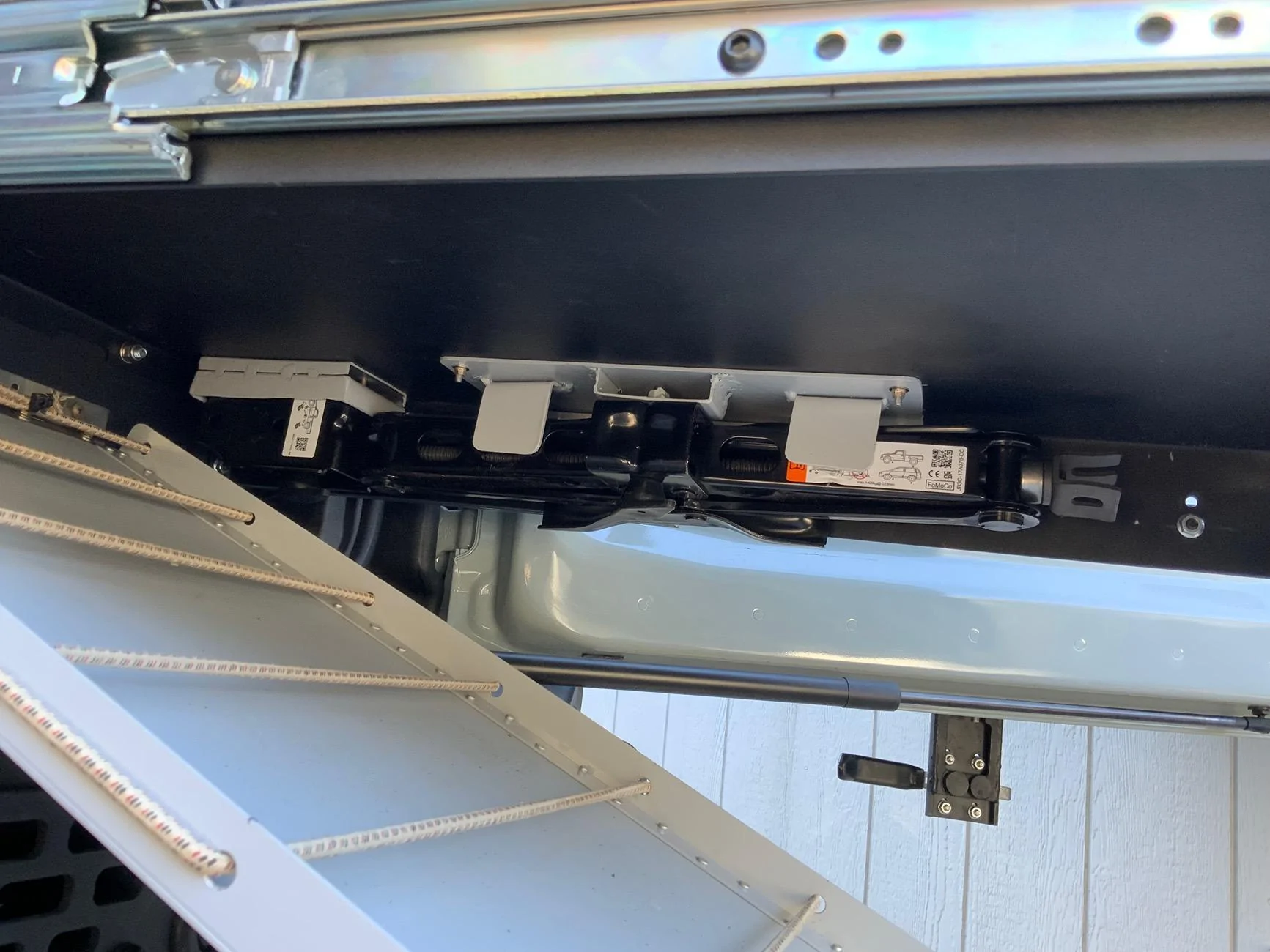 Ford Bronco Created extra storage space beneath fridge slide out IMG_1892