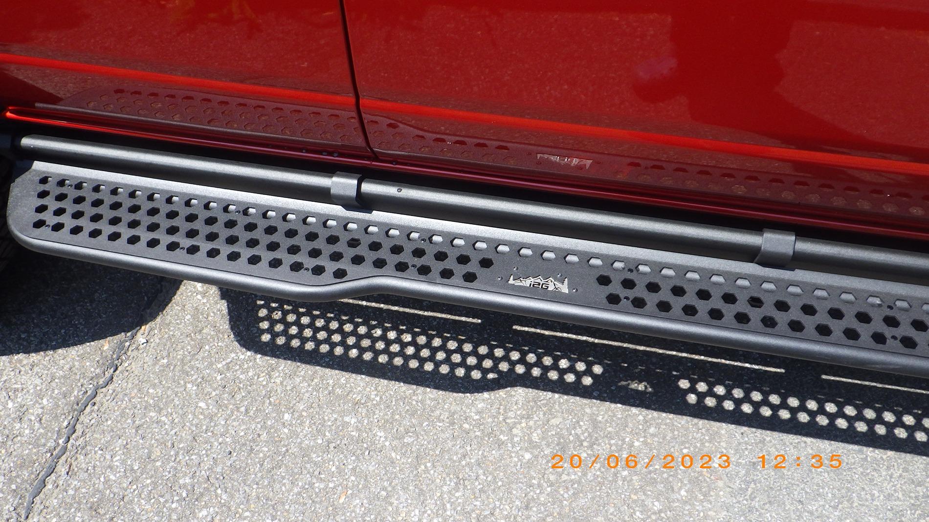 Ford Bronco Mud flaps that are compatible with the factory removable hoop step? RIMG8118.JPG