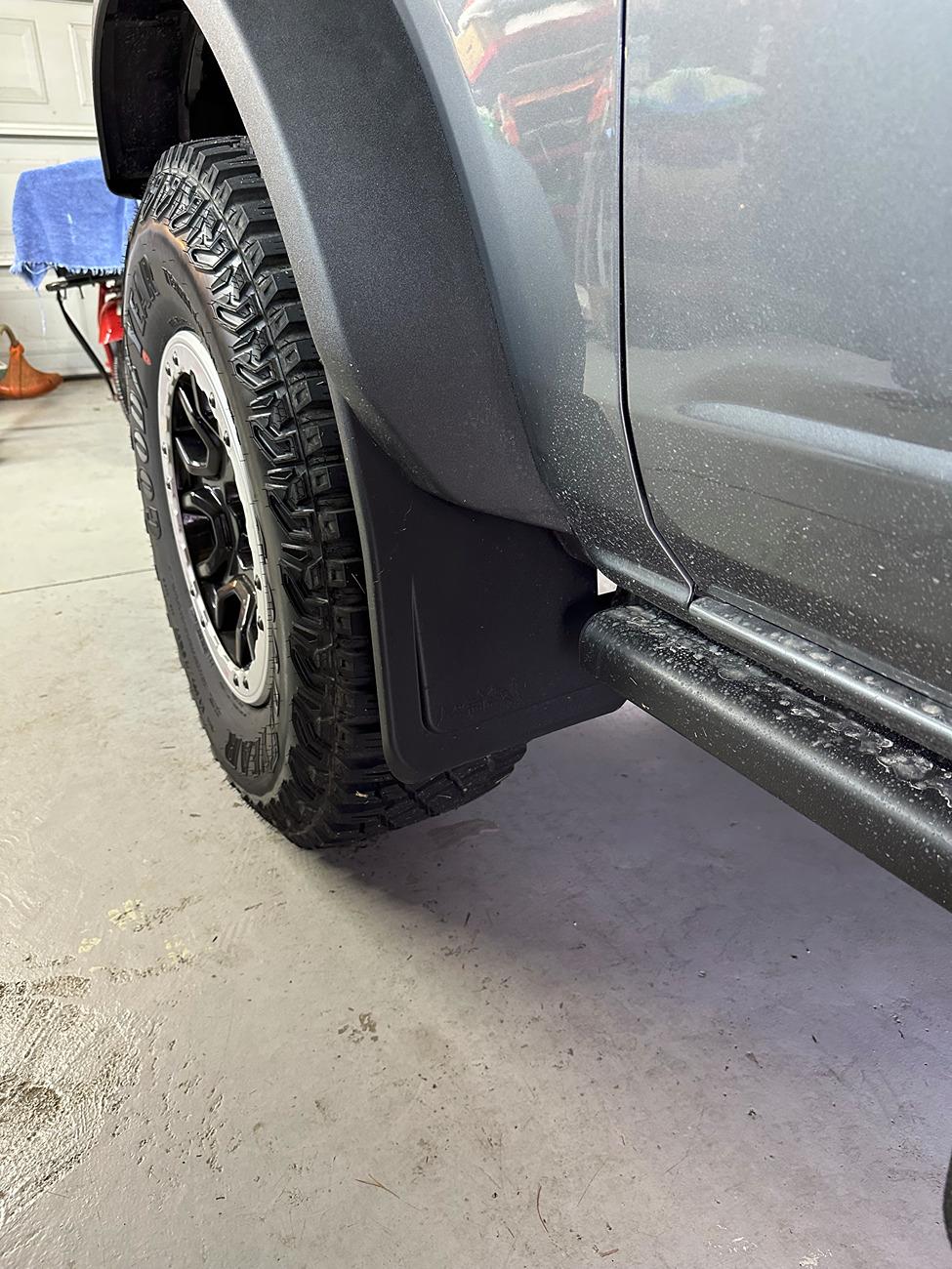 Ford Bronco Mud flaps that are compatible with the factory removable hoop step? Flap Far
