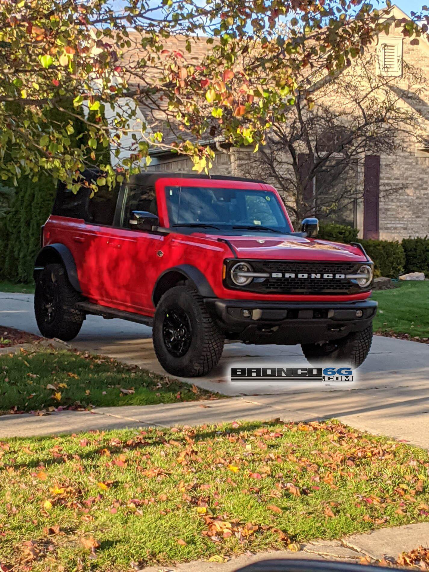 Ford Bronco Wildtrak with carbonized gray grille Race Red Wildtrak Bronco 4 Door Soft Top 2