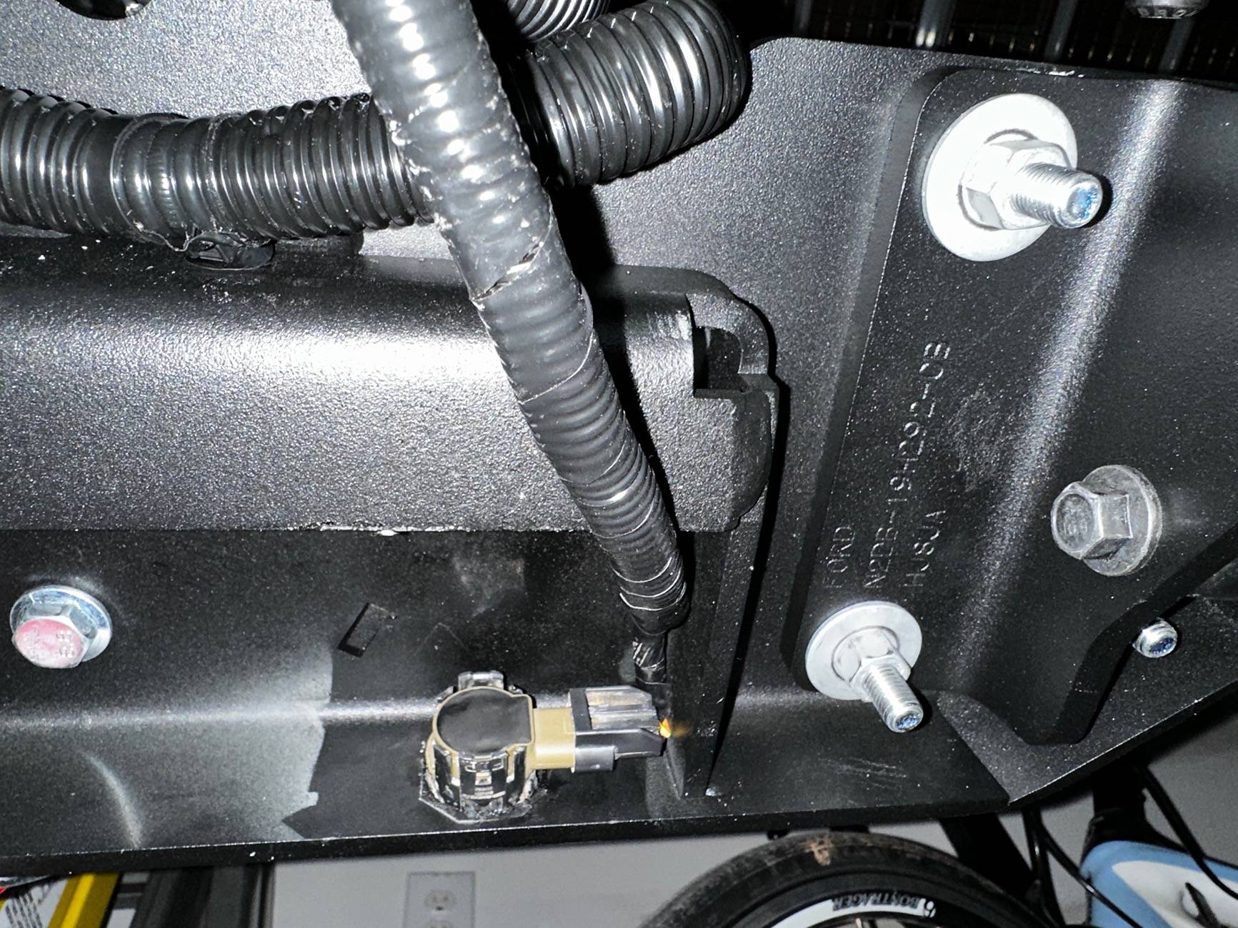 Ford Bronco Park Aid Sensor Relocation on Factory/Warn Winch IMG_9436