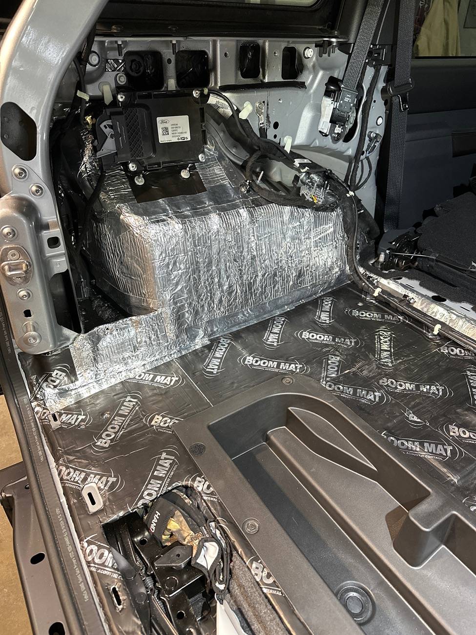 Ford Bronco Adding Rear Factory Hitch, adding boom mat (sound deadening), upgrading Sub image