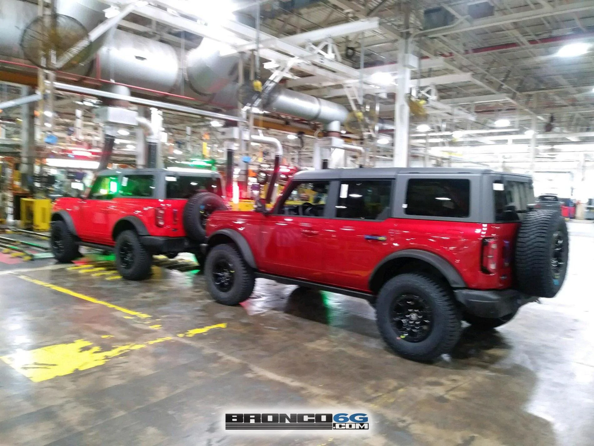 Ford Bronco 10 New Factory Broncos courtesy of The Stig??? 9 - Rapid Red Wildtrak 4 door Bronco 1- Factory Production Plant