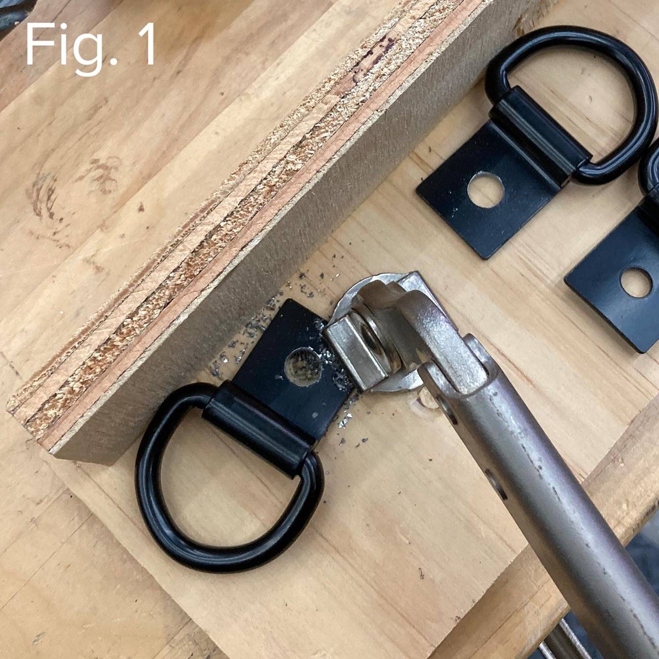 Ford Bronco Budget tie downs on the rear shell bolts 1-tie-down-drill-out