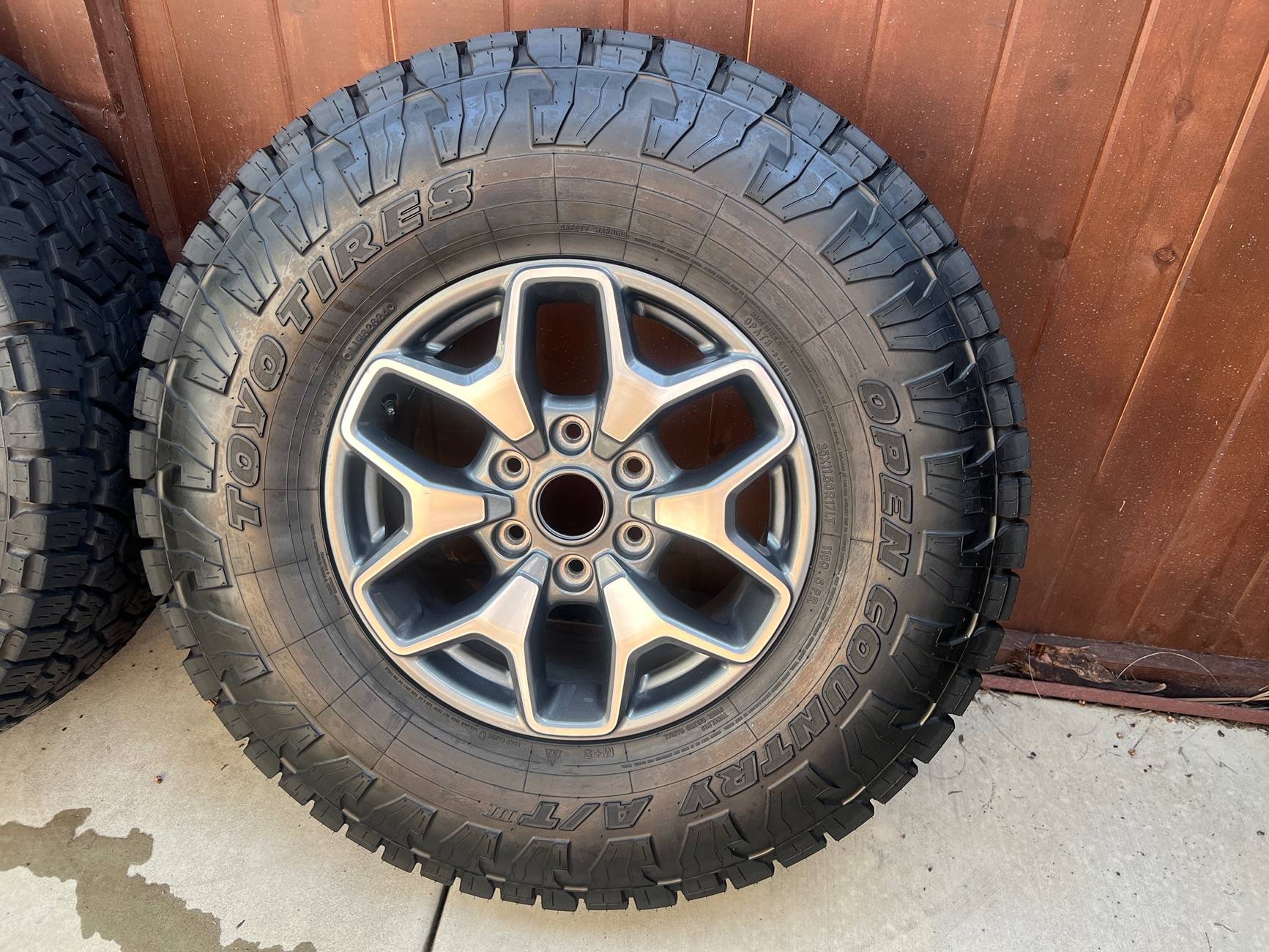 Ford Bronco (5) 35" Toyo Open Country AT3 mounted on Badlands wheels. Low miles and TPMS included. IMG_5418