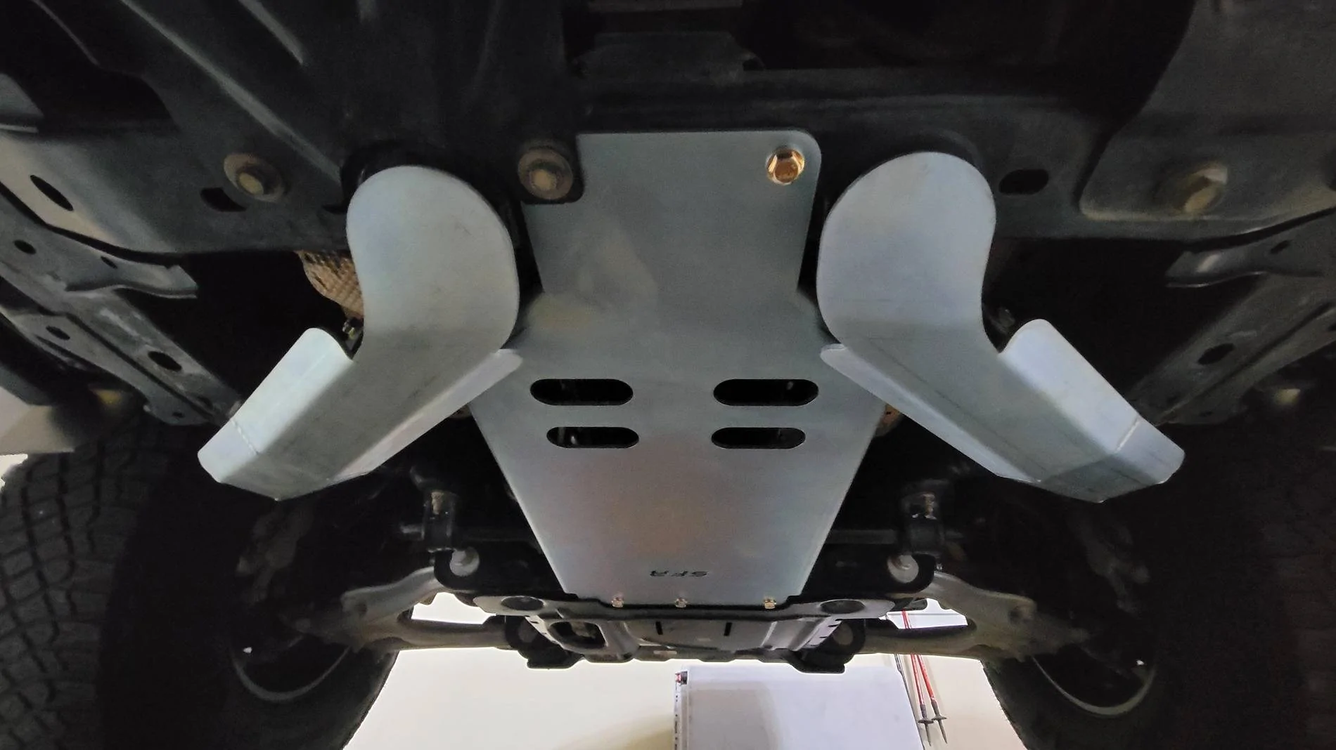 Ford Bronco SFR transmission and crossmember brace skids installed 54570771762_5c52e278f3_o