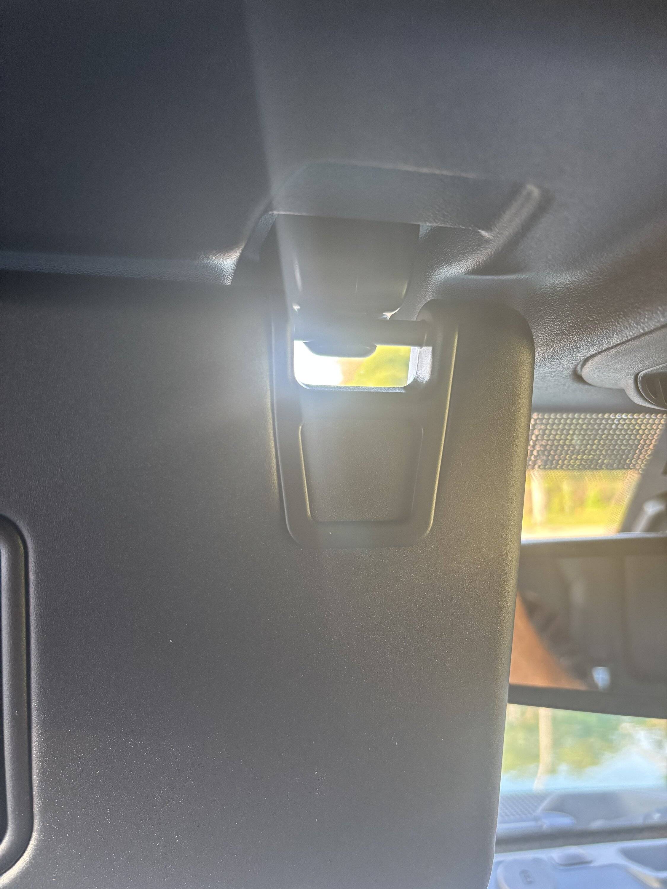 Ford Bronco Sunlight in visor hinge IMG_0579