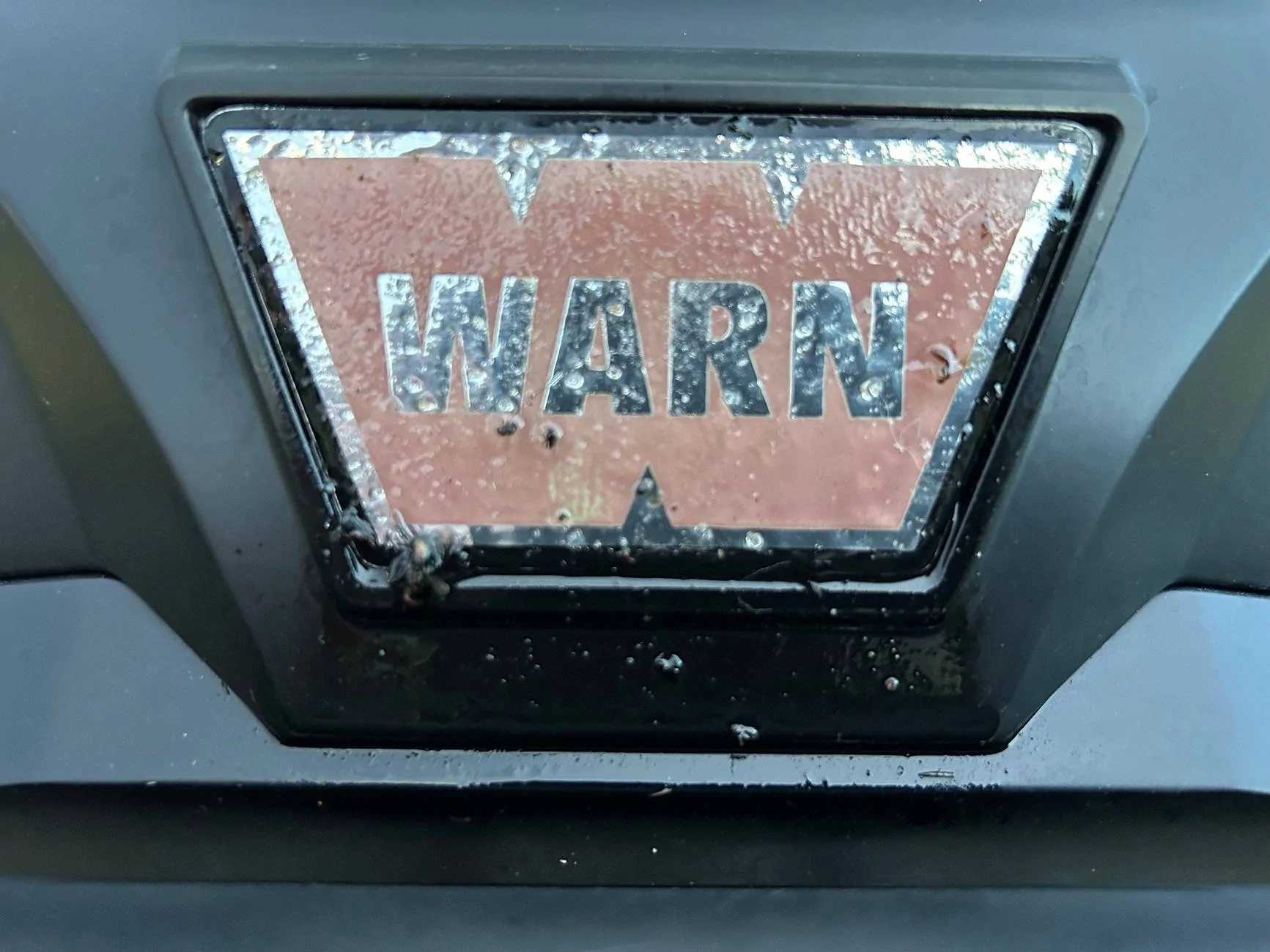 Ford Bronco WARN bubbled sticker on Ford Performance Warn winch and mount. IMG_1820