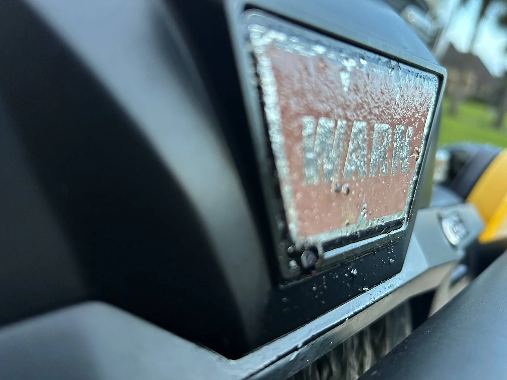 Ford Bronco WARN bubbled sticker on Ford Performance Warn winch and mount. IMG_1821